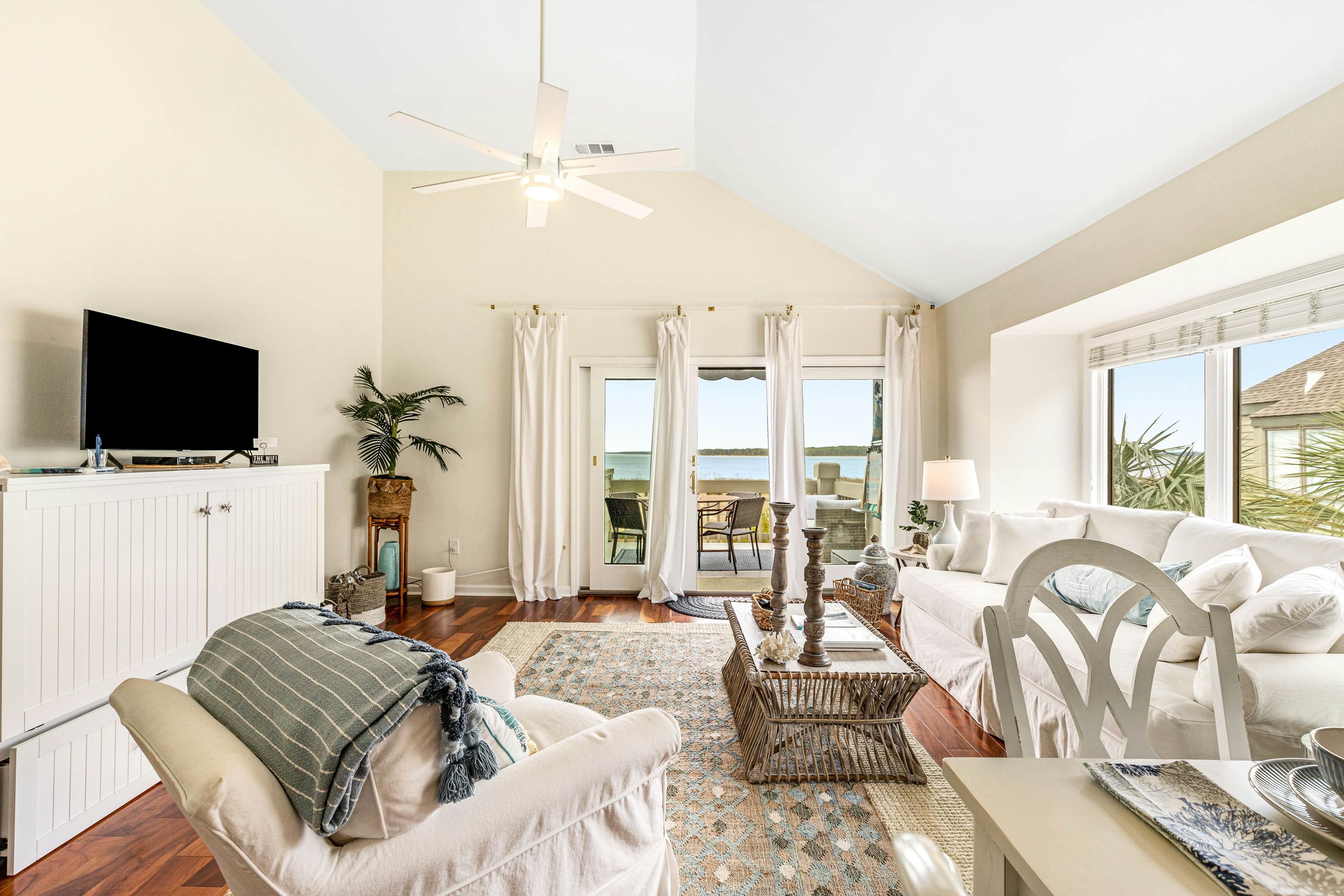 2nd floor villa with water views, lovely balcony & w/d - walk to Beach Club