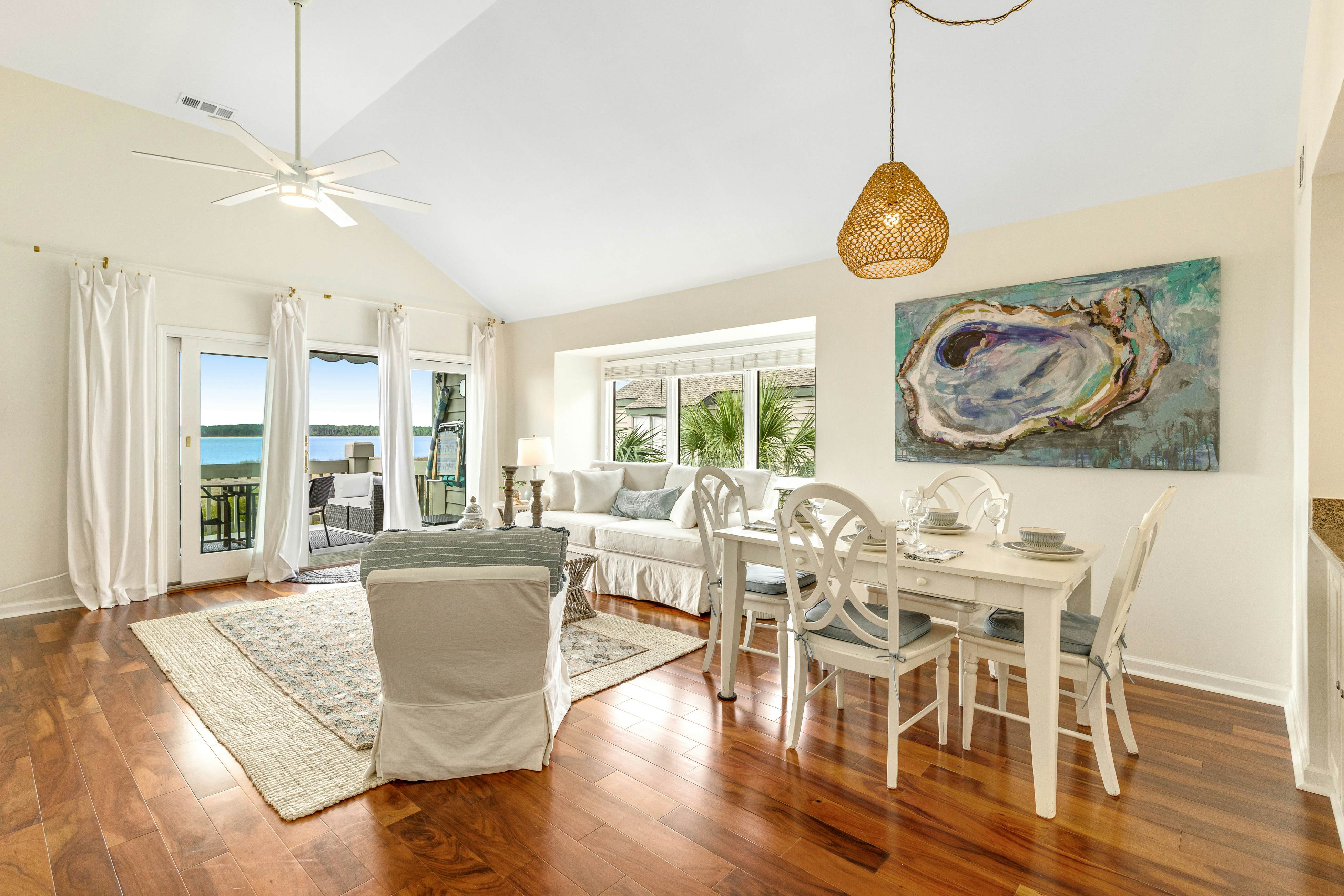 2nd floor villa with water views, lovely balcony & w/d - walk to Beach Club