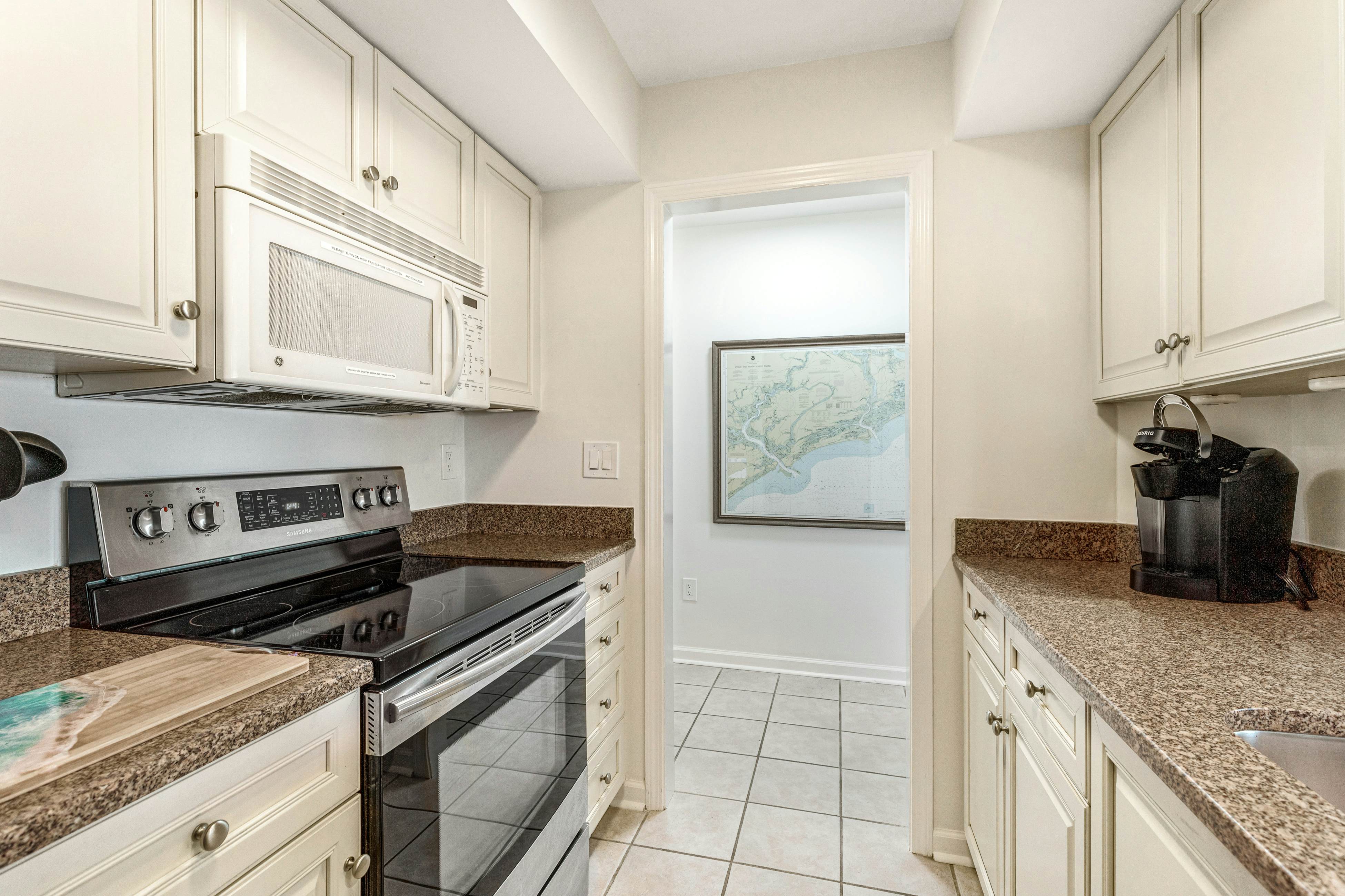 2nd floor villa with water views, lovely balcony & w/d - walk to Beach Club