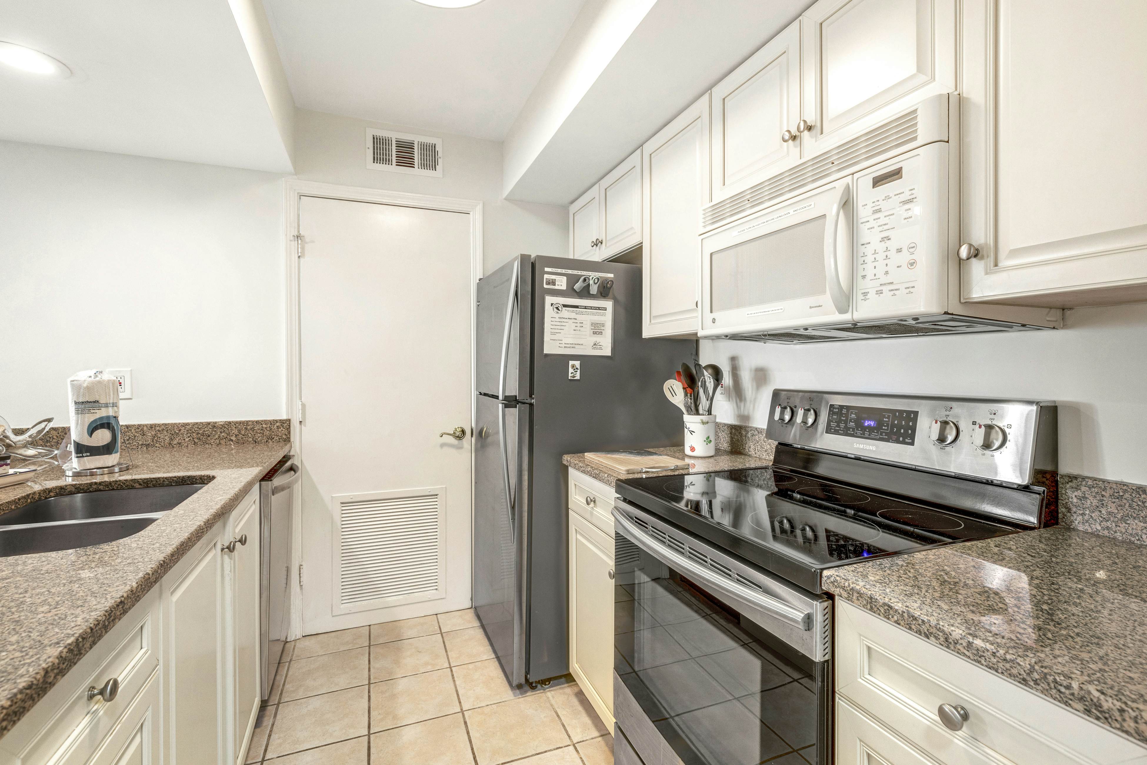 2nd floor villa with water views, lovely balcony & w/d - walk to Beach Club