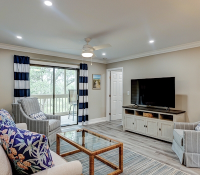 Fully updated condo with serene view, enclosed balcony, WiFi, W/D, pool, & gym