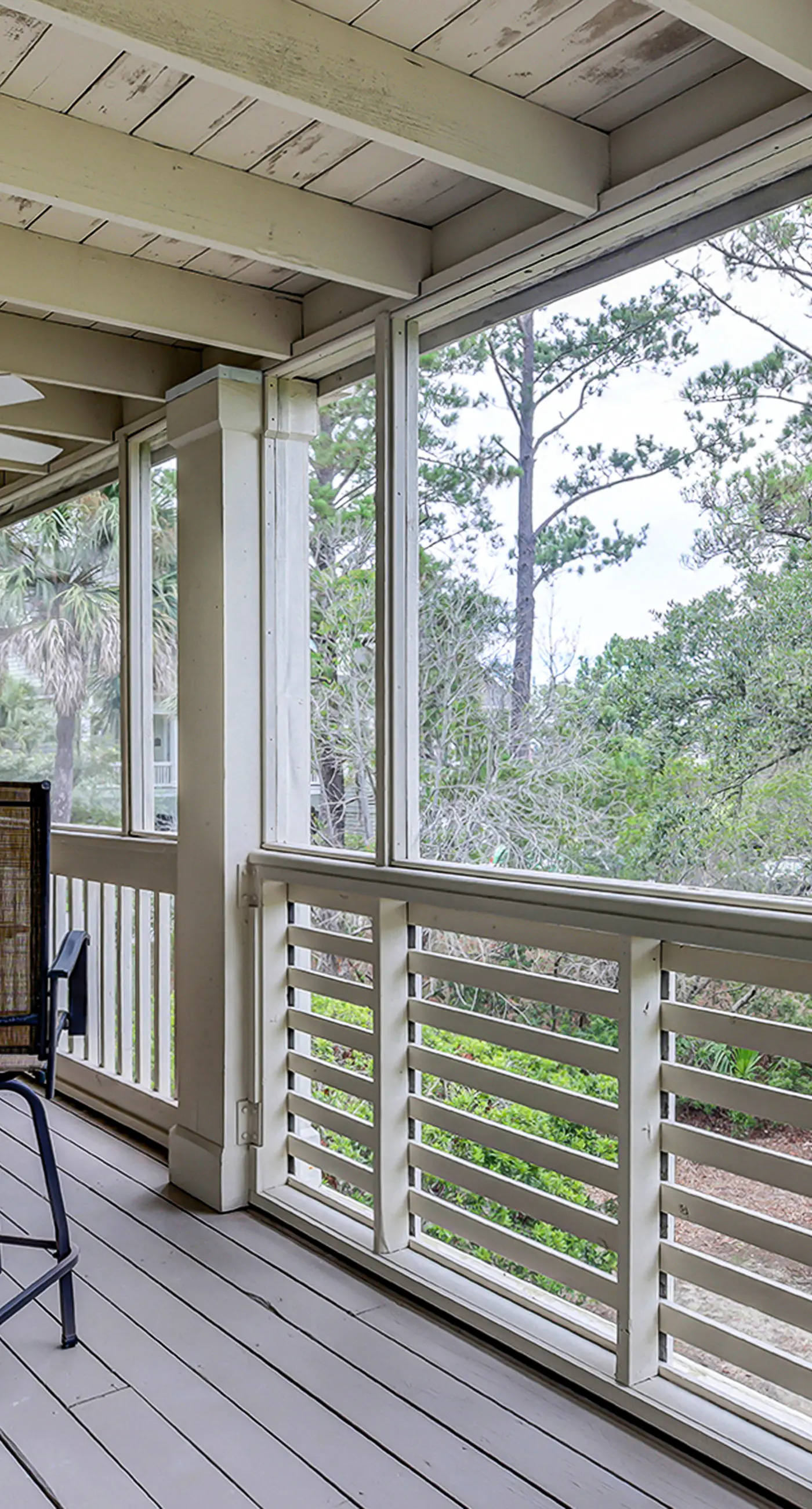 Fully updated condo with serene view, enclosed balcony, WiFi, W/D, pool, & gym