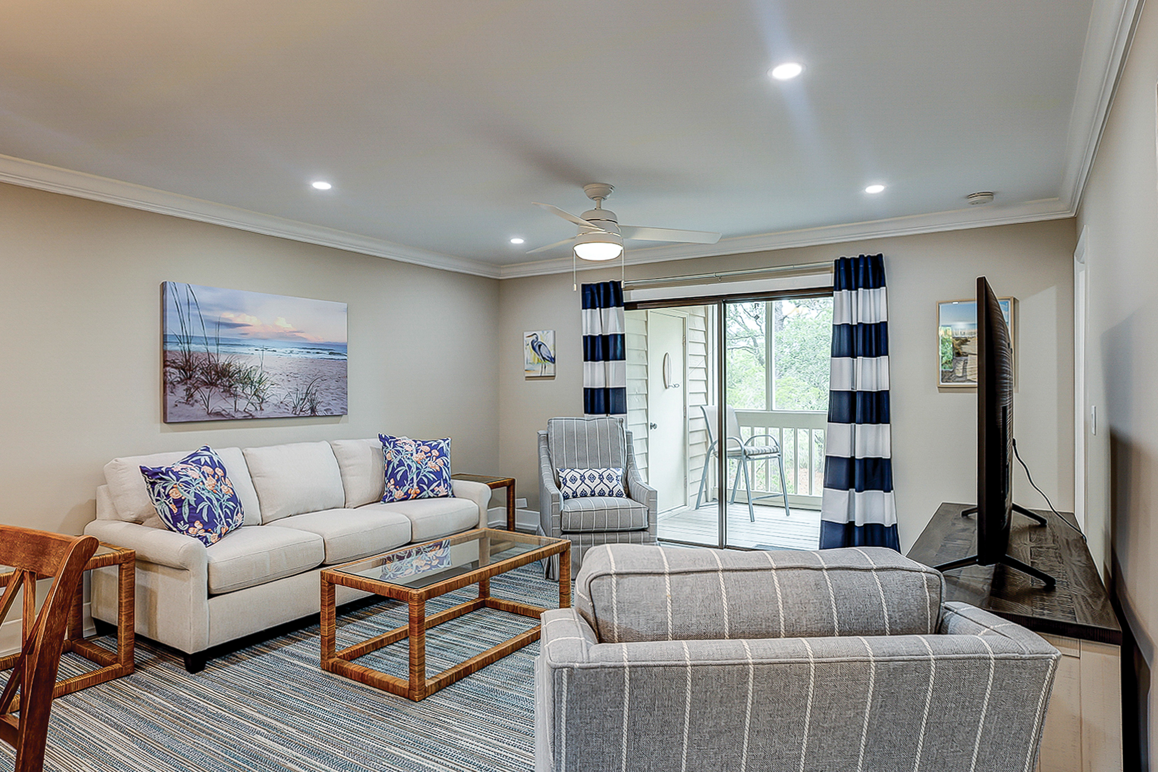 Fully updated condo with serene view, enclosed balcony, WiFi, W/D, pool, & gym