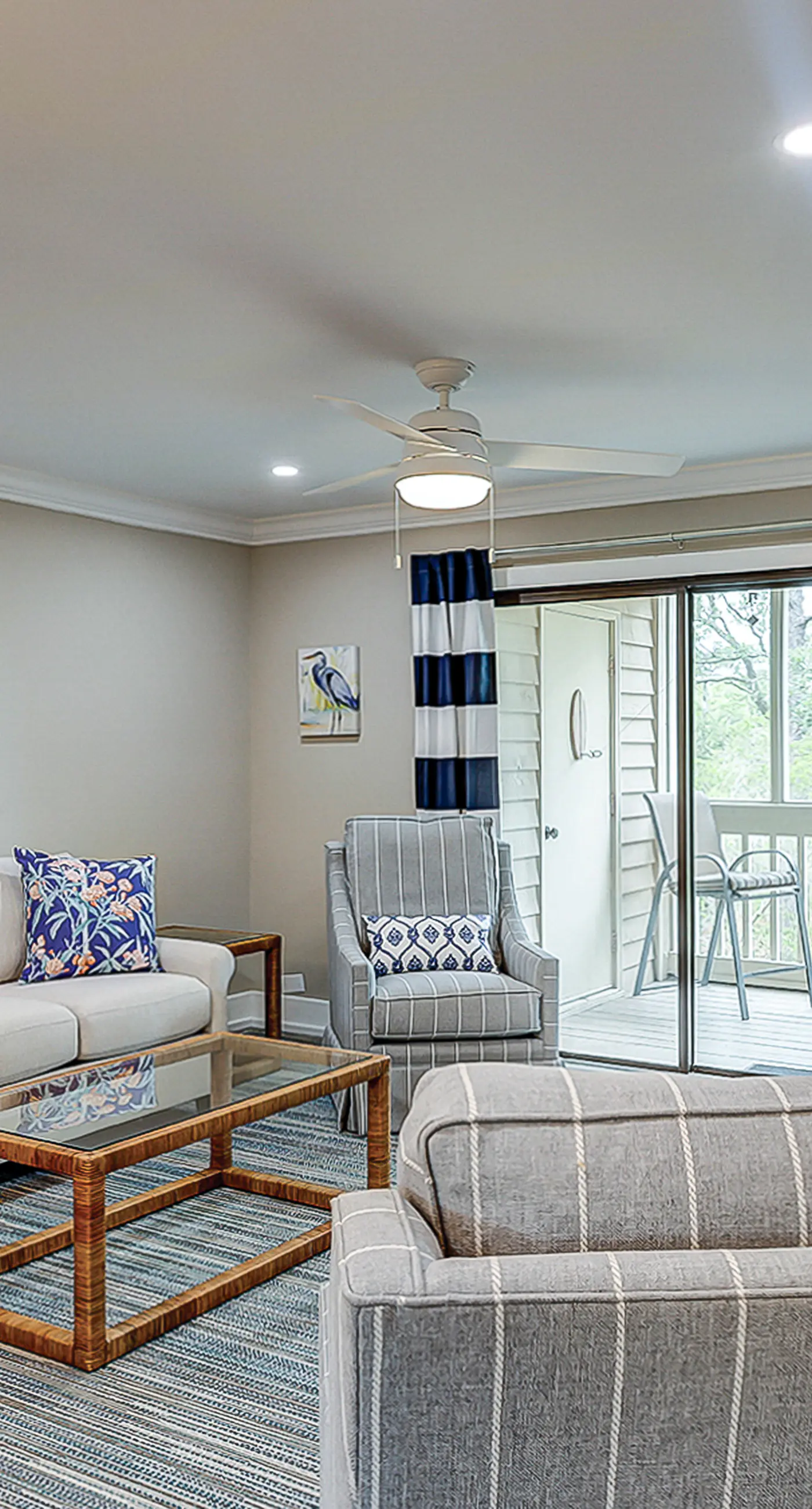 Fully updated condo with serene view, enclosed balcony, WiFi, W/D, pool, & gym