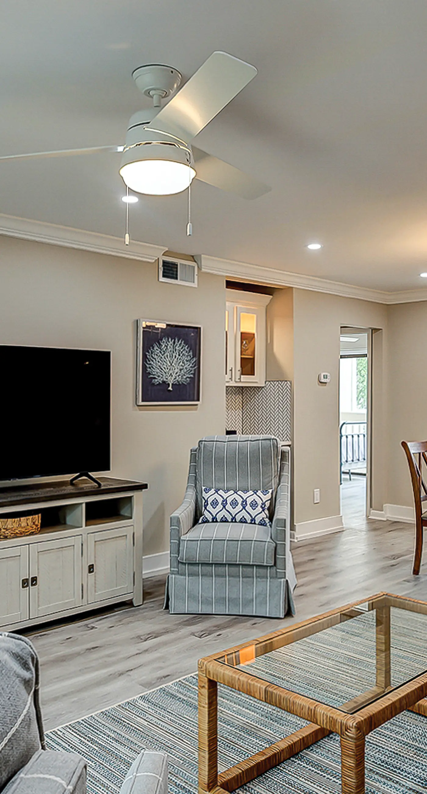 Fully updated condo with serene view, enclosed balcony, WiFi, W/D, pool, & gym