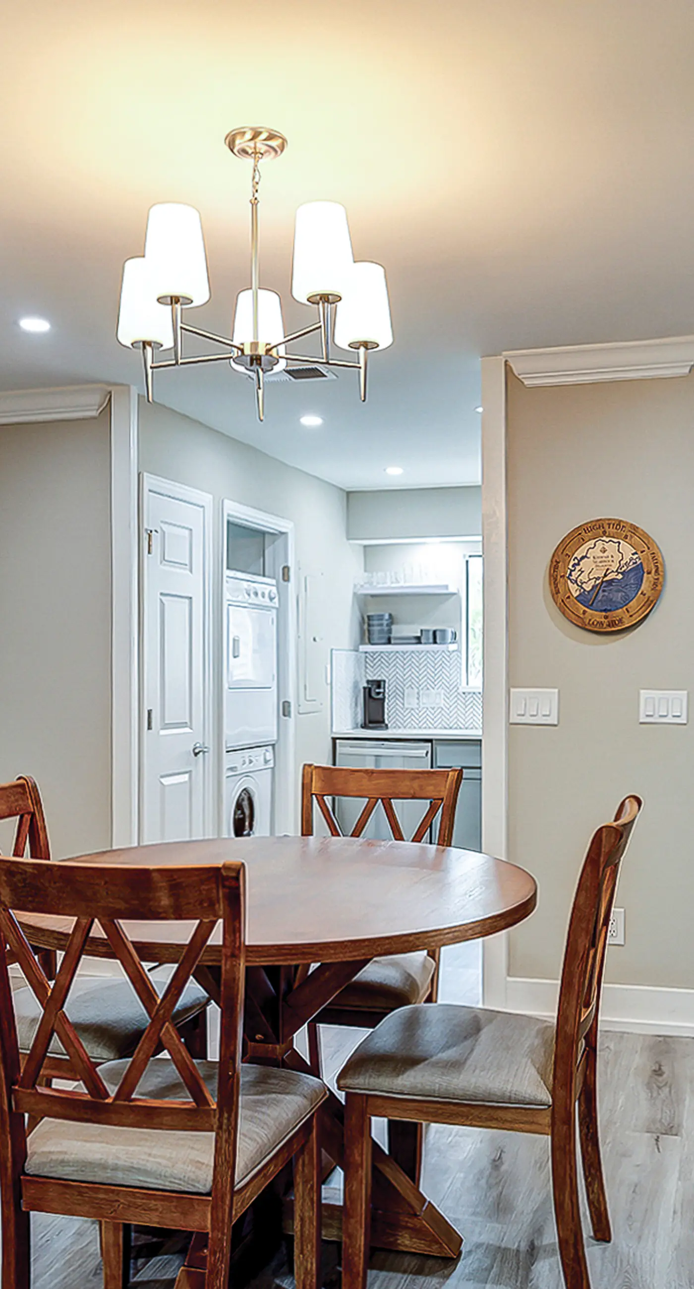 Fully updated condo with serene view, enclosed balcony, WiFi, W/D, pool, & gym