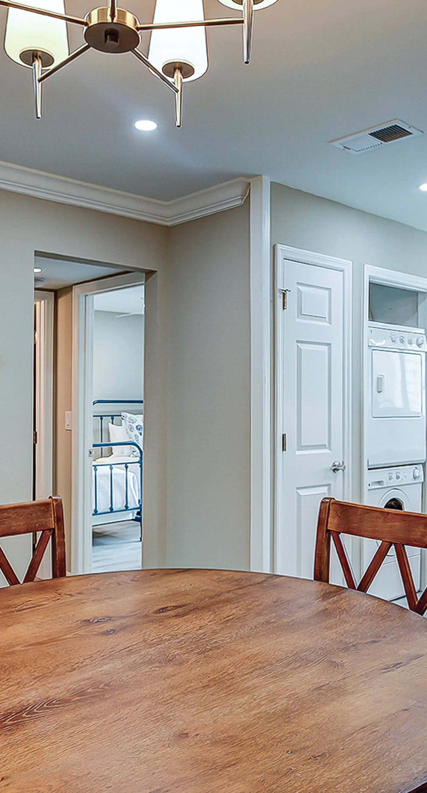Fully updated condo with serene view, enclosed balcony, WiFi, W/D, pool, & gym