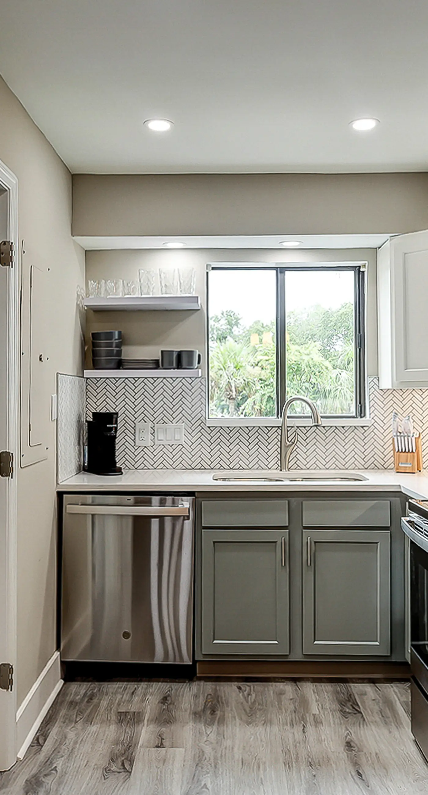 Fully updated condo with serene view, enclosed balcony, WiFi, W/D, pool, & gym