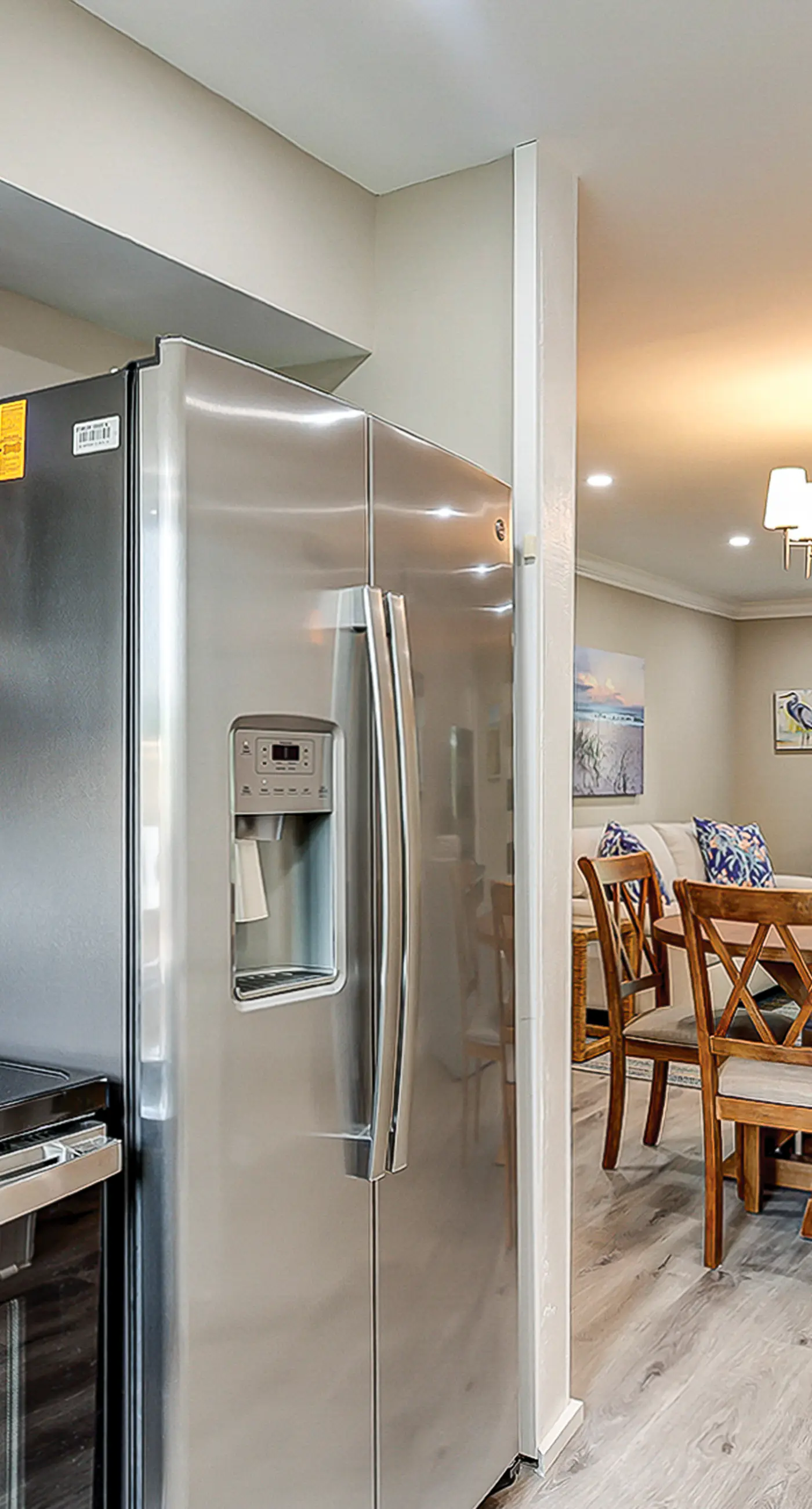 Fully updated condo with serene view, enclosed balcony, WiFi, W/D, pool, & gym