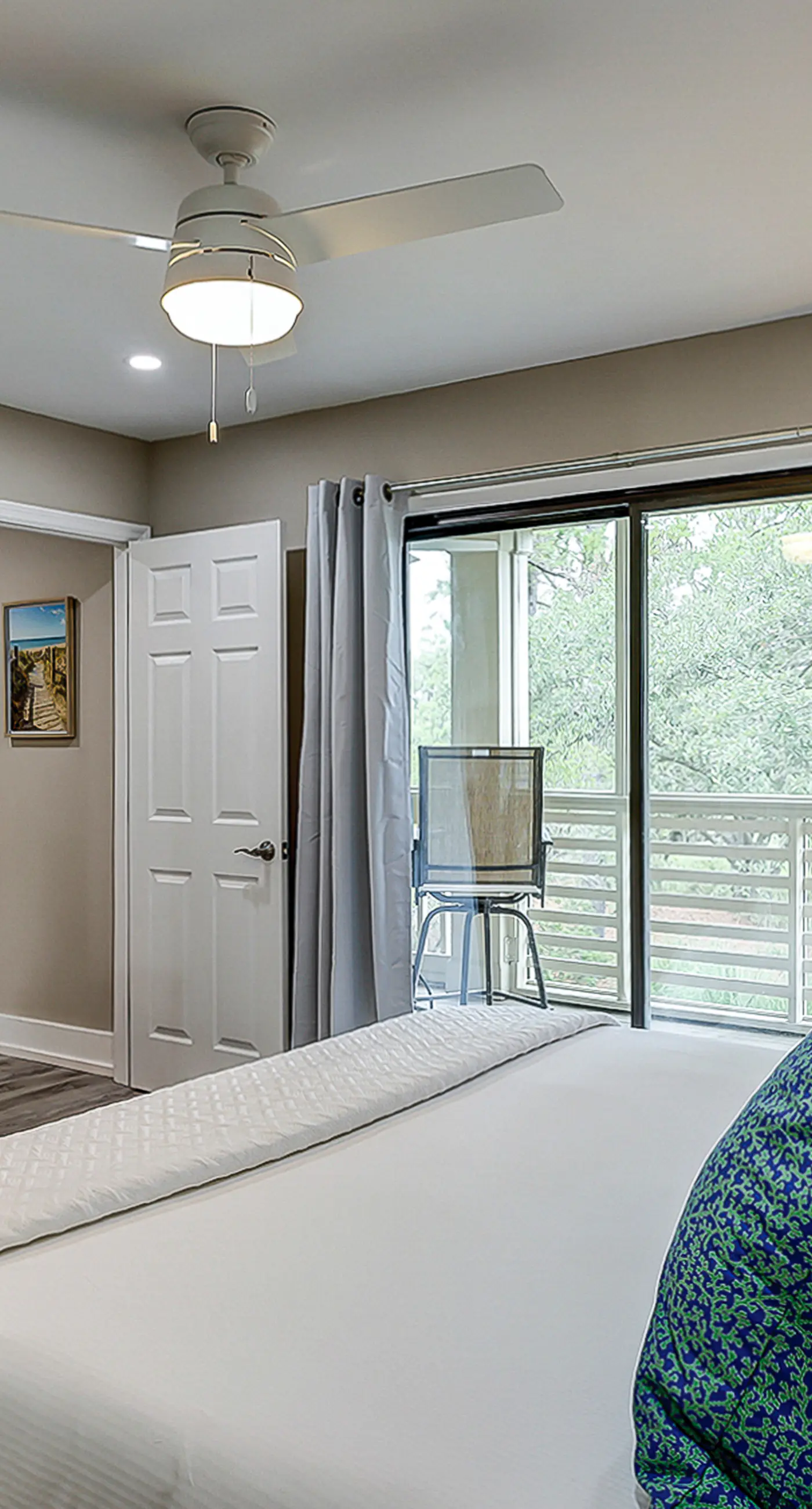 Fully updated condo with serene view, enclosed balcony, WiFi, W/D, pool, & gym