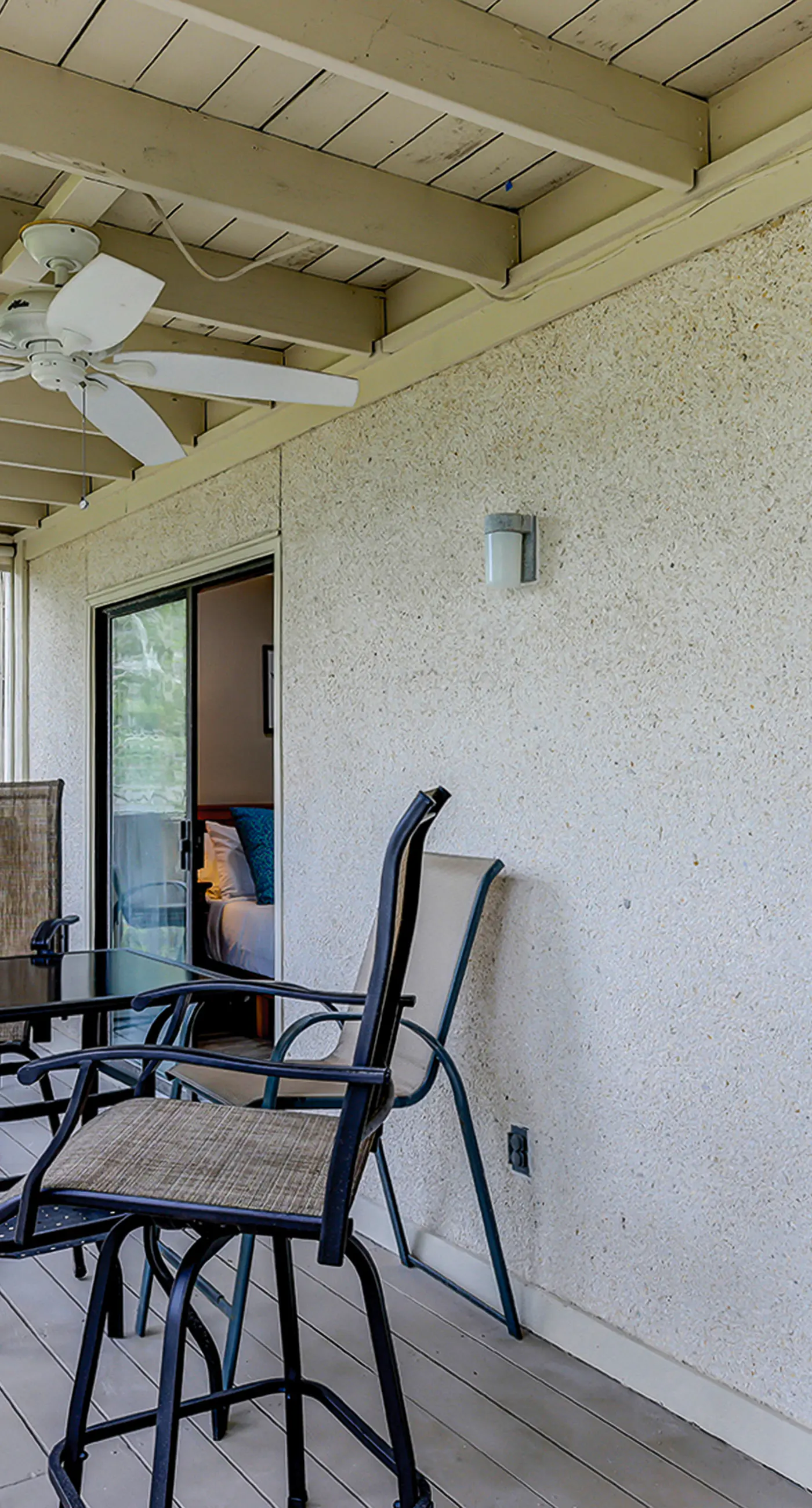 Fully updated condo with serene view, enclosed balcony, WiFi, W/D, pool, & gym