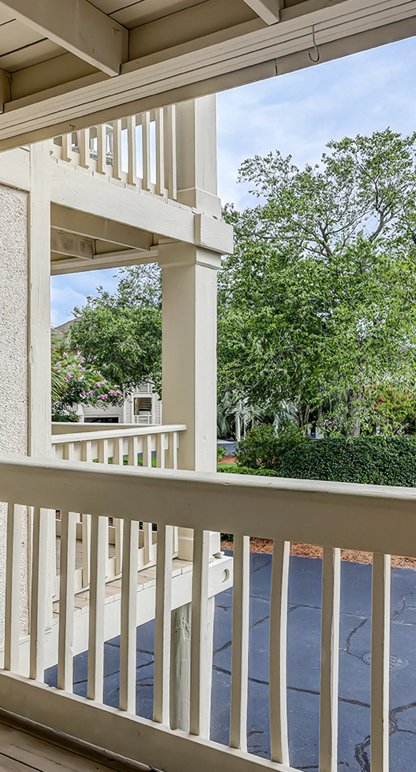 Fully updated condo with serene view, enclosed balcony, WiFi, W/D, pool, & gym