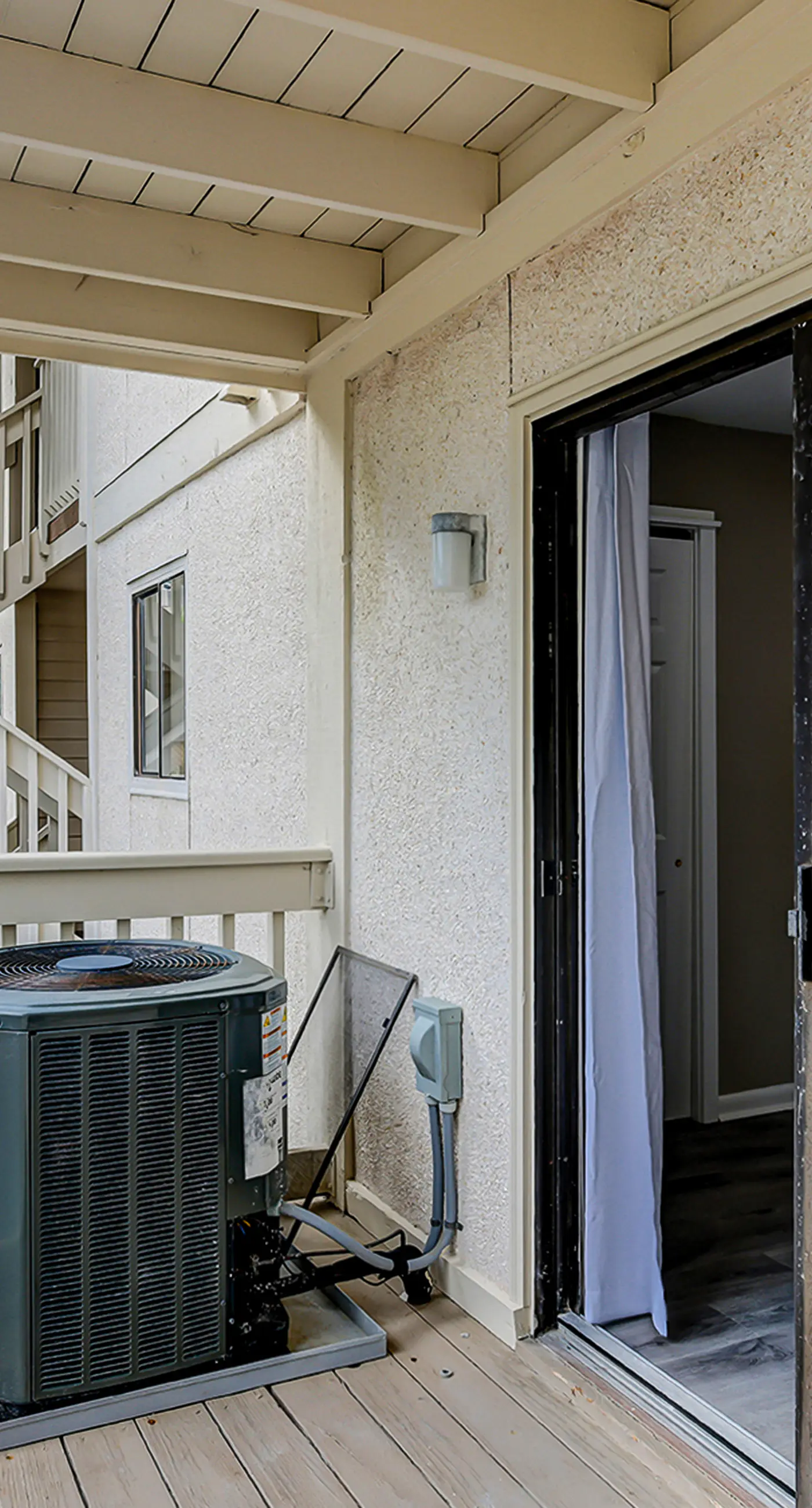 Fully updated condo with serene view, enclosed balcony, WiFi, W/D, pool, & gym