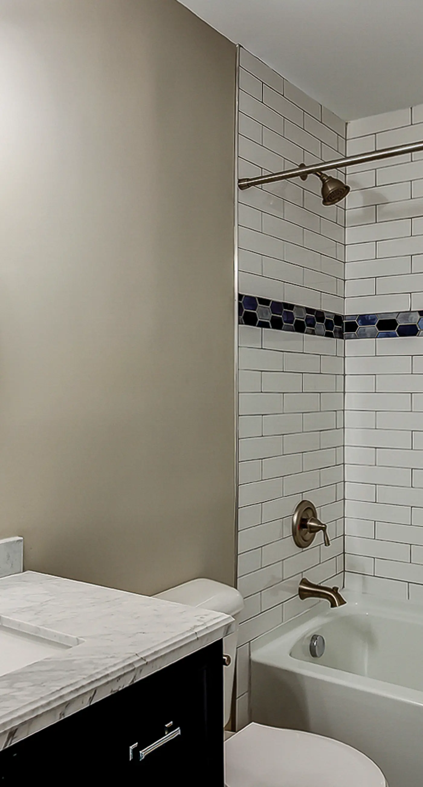 Fully updated condo with serene view, enclosed balcony, WiFi, W/D, pool, & gym
