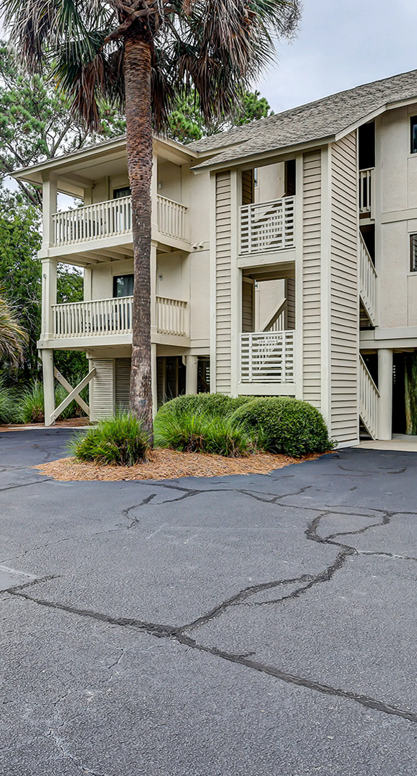 Fully updated condo with serene view, enclosed balcony, WiFi, W/D, pool, & gym