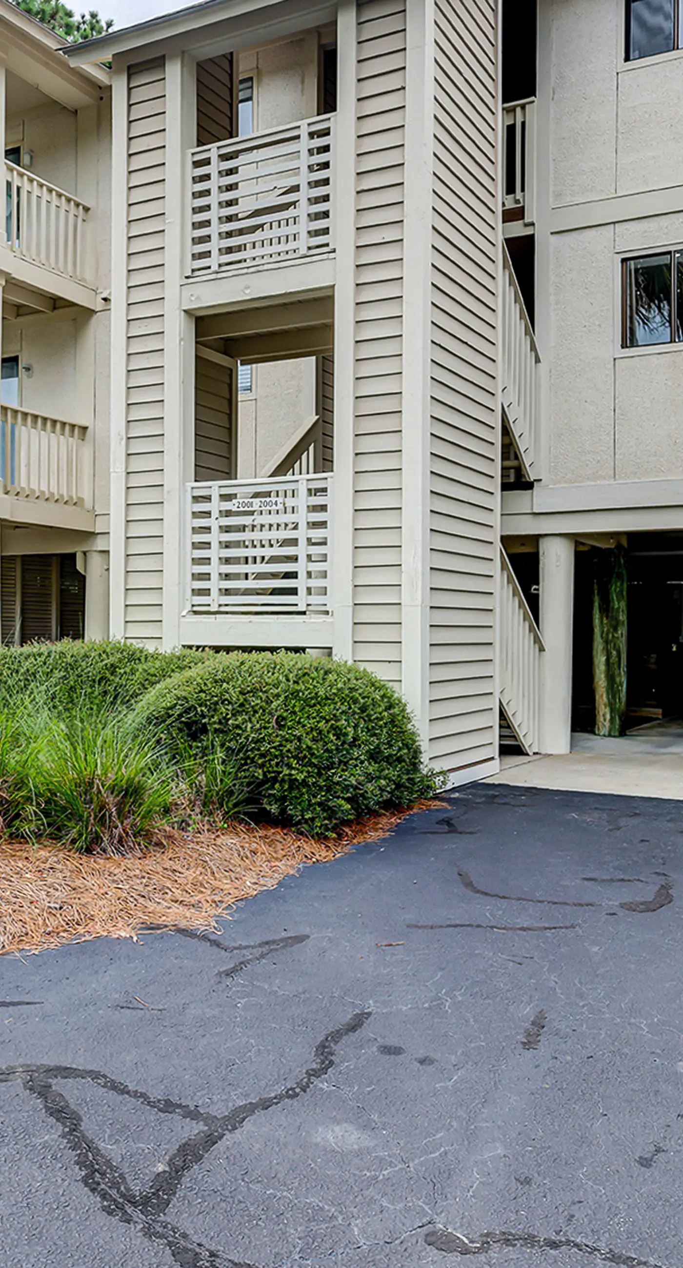 Fully updated condo with serene view, enclosed balcony, WiFi, W/D, pool, & gym