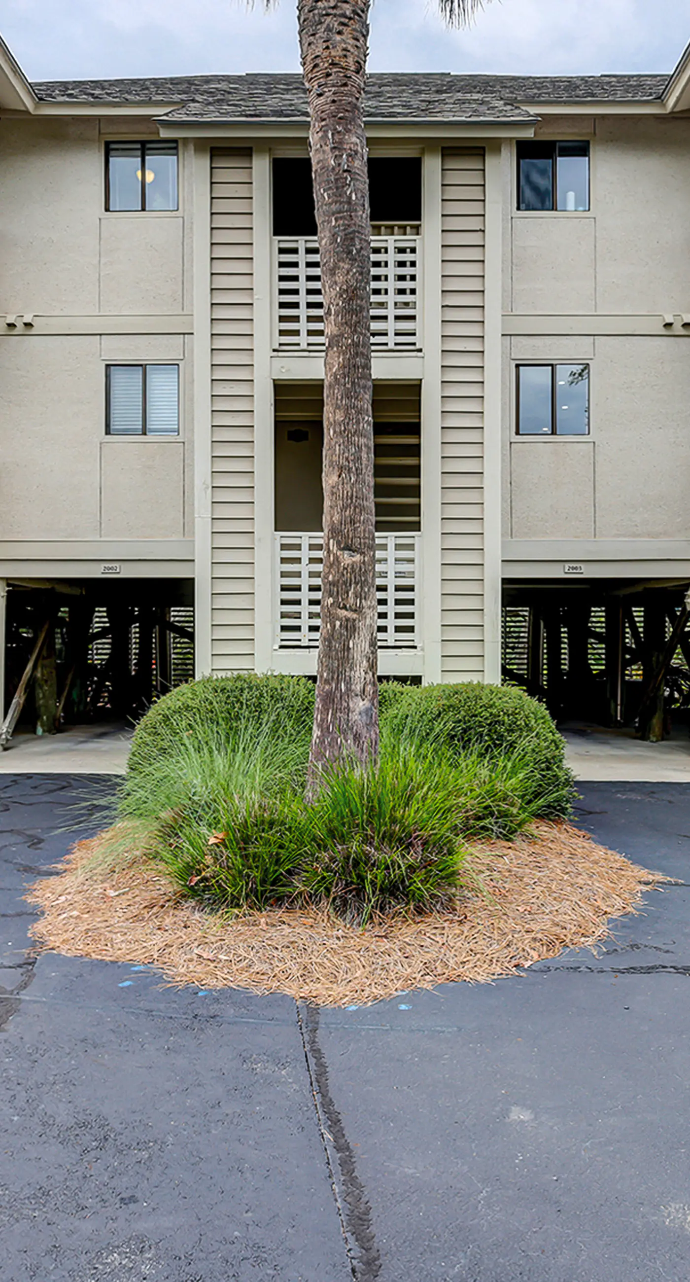 Fully updated condo with serene view, enclosed balcony, WiFi, W/D, pool, & gym