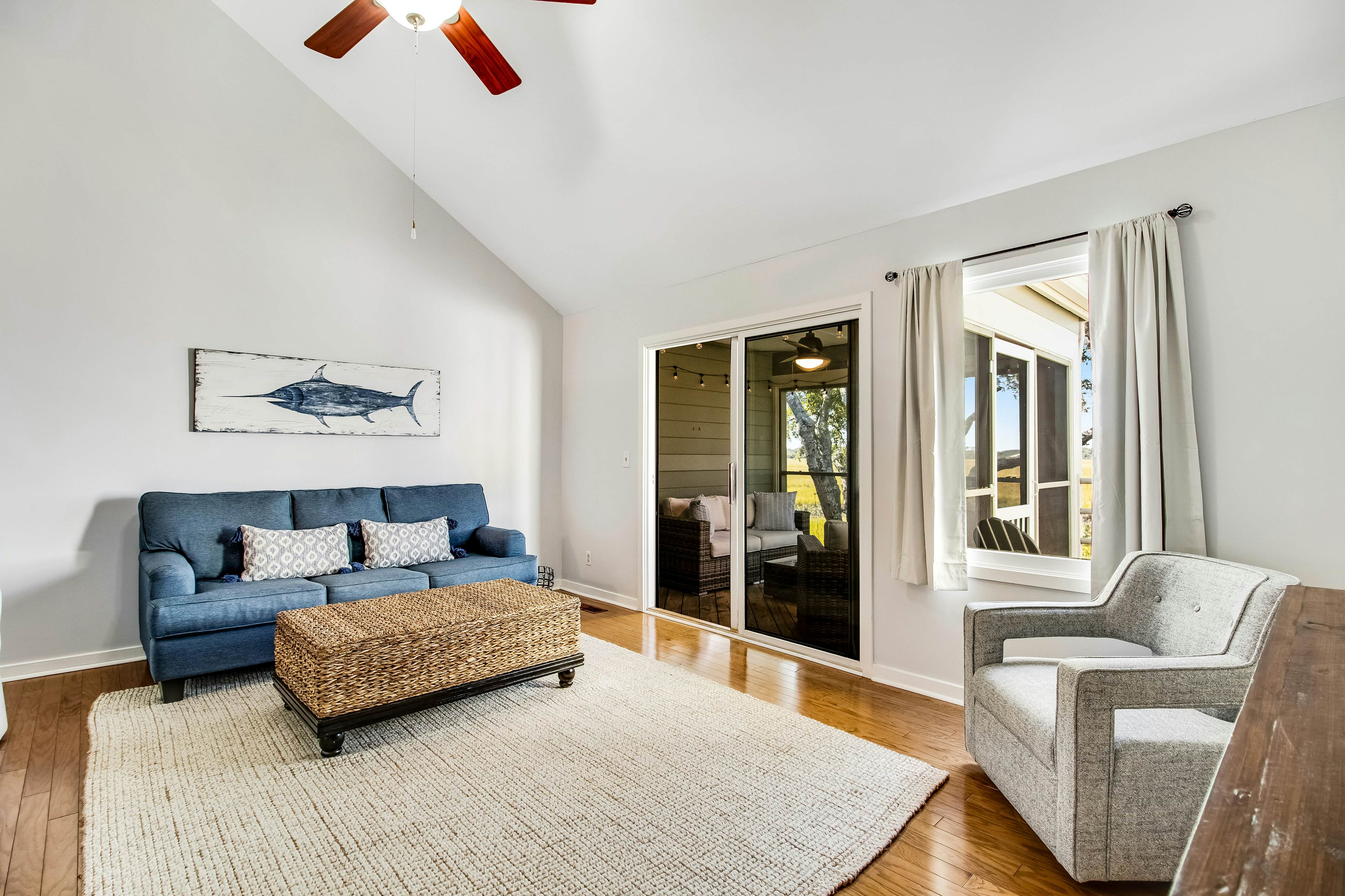 Three-level marsh-front villa with screened porch - walk to all amenities