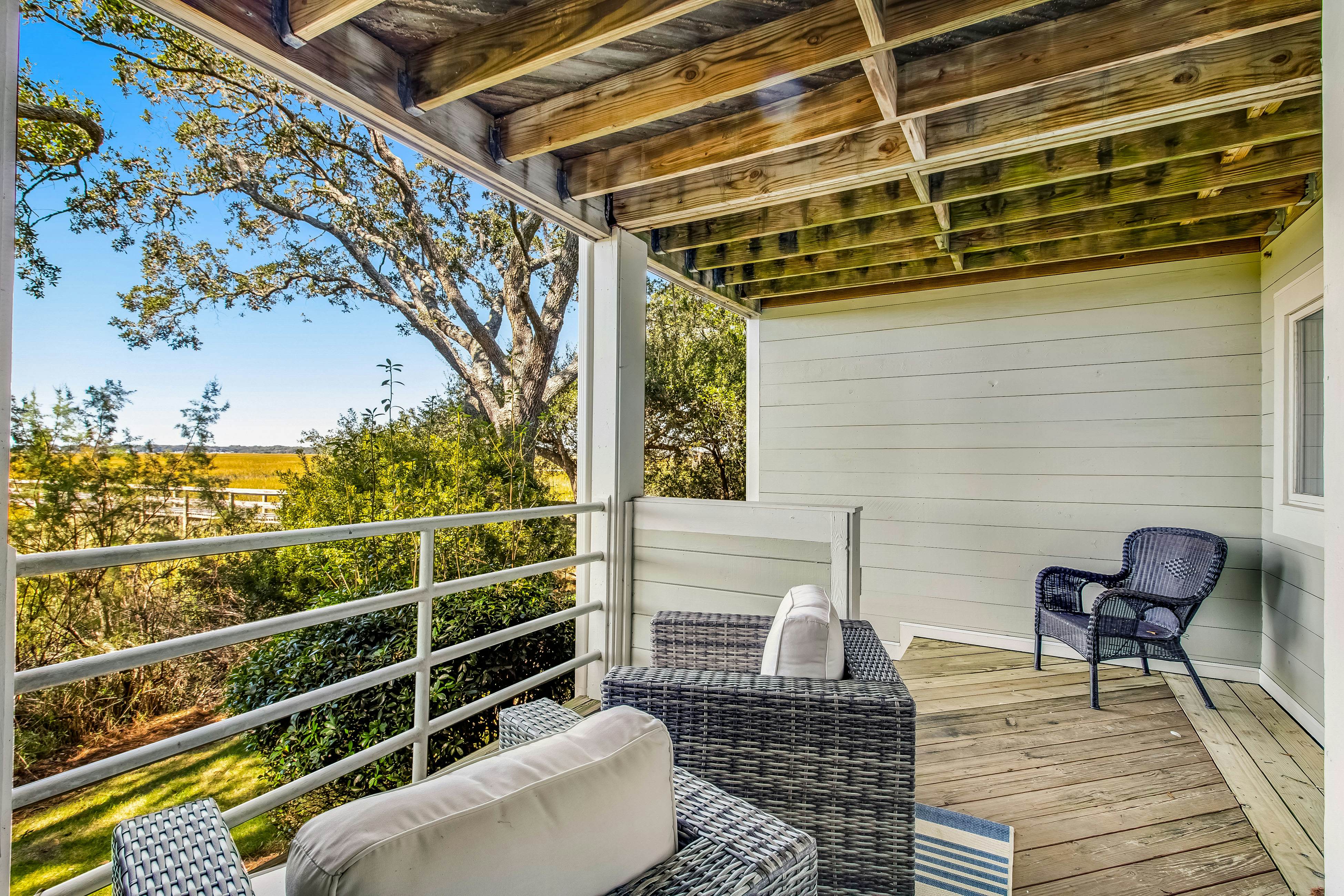 Three-level marsh-front villa with screened porch - walk to all amenities