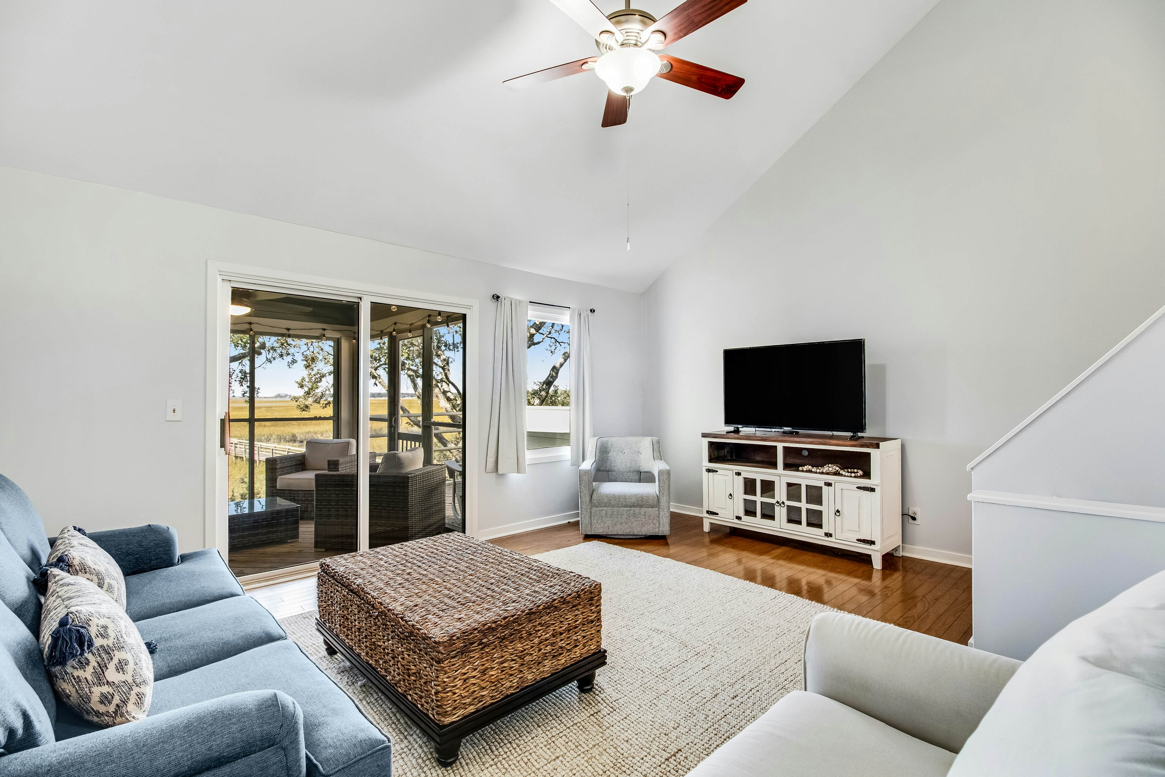 Three-level marsh-front villa with screened porch - walk to all amenities