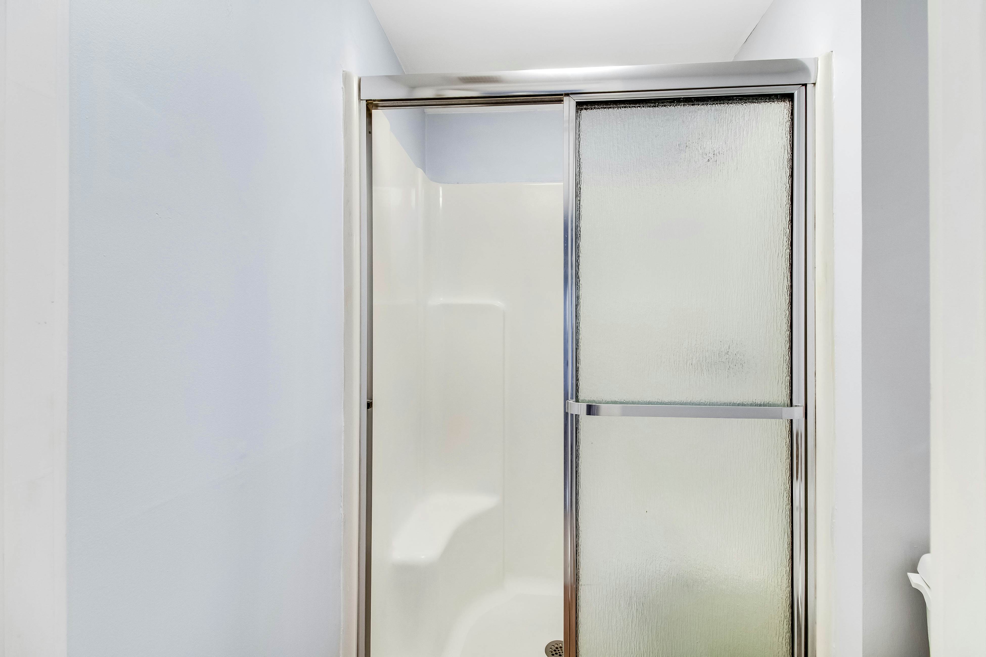 Three-level marsh-front villa with screened porch - walk to all amenities