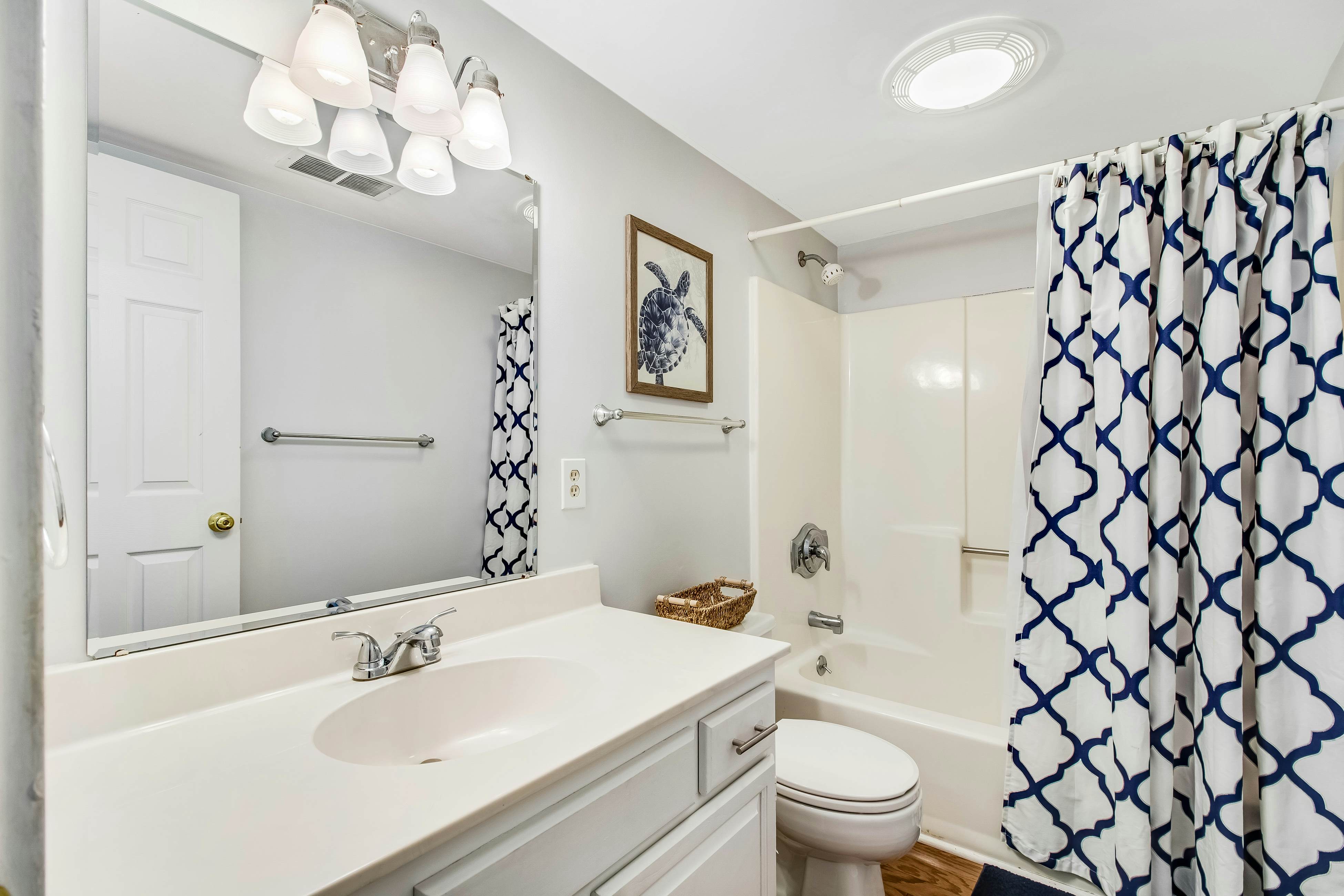 Three-level marsh-front villa with screened porch - walk to all amenities