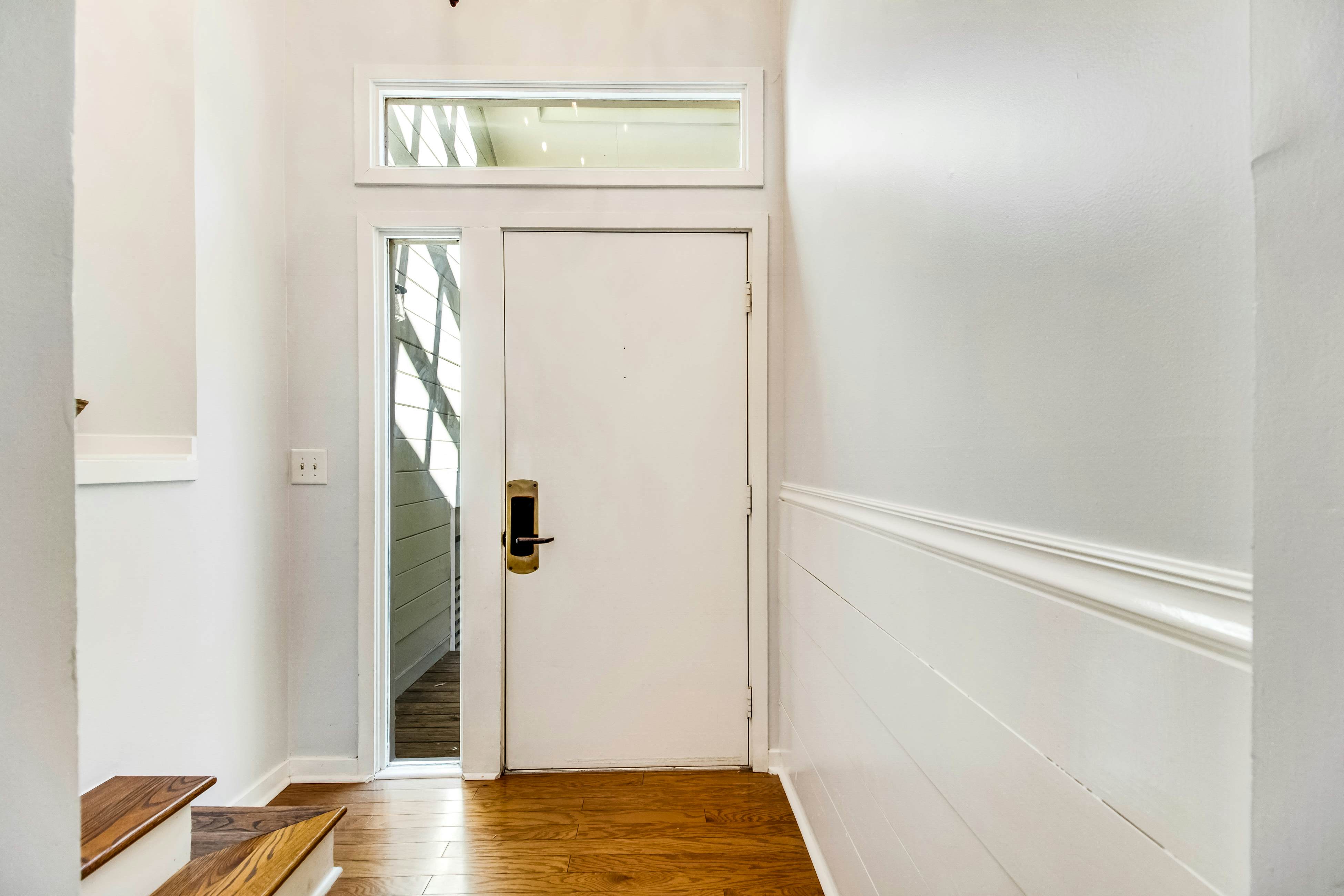 Three-level marsh-front villa with screened porch - walk to all amenities