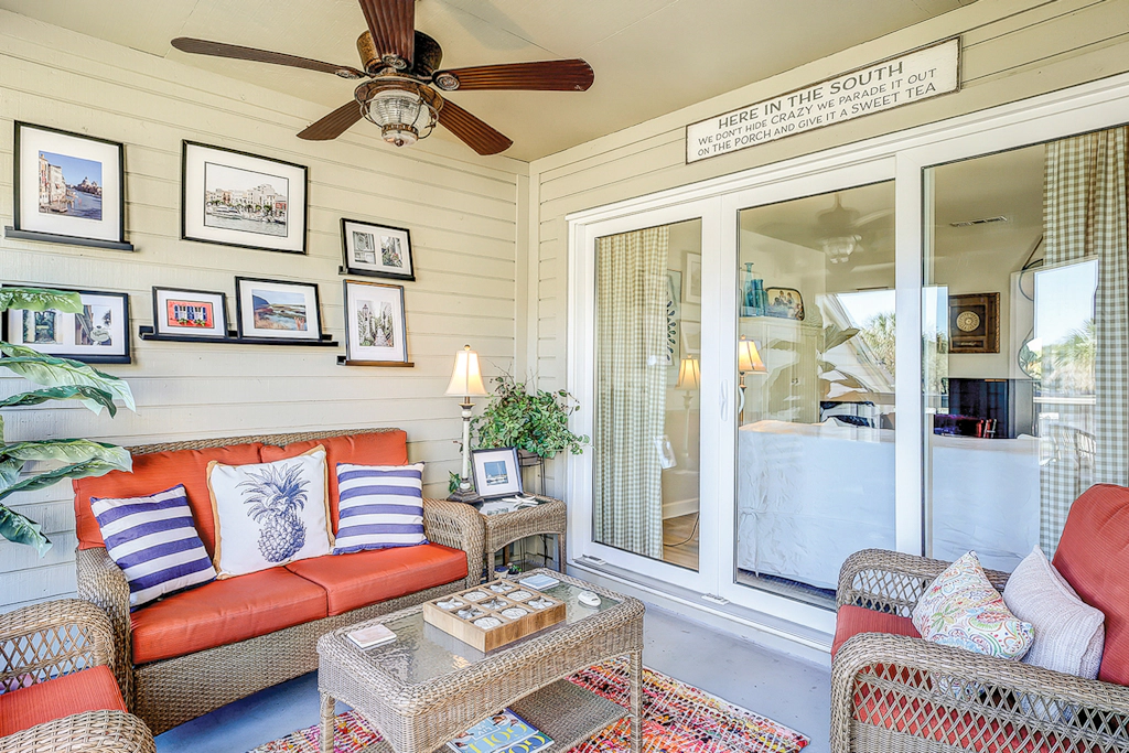 Lovely condo near beach with enclosed porch, pool, tennis, and golf access