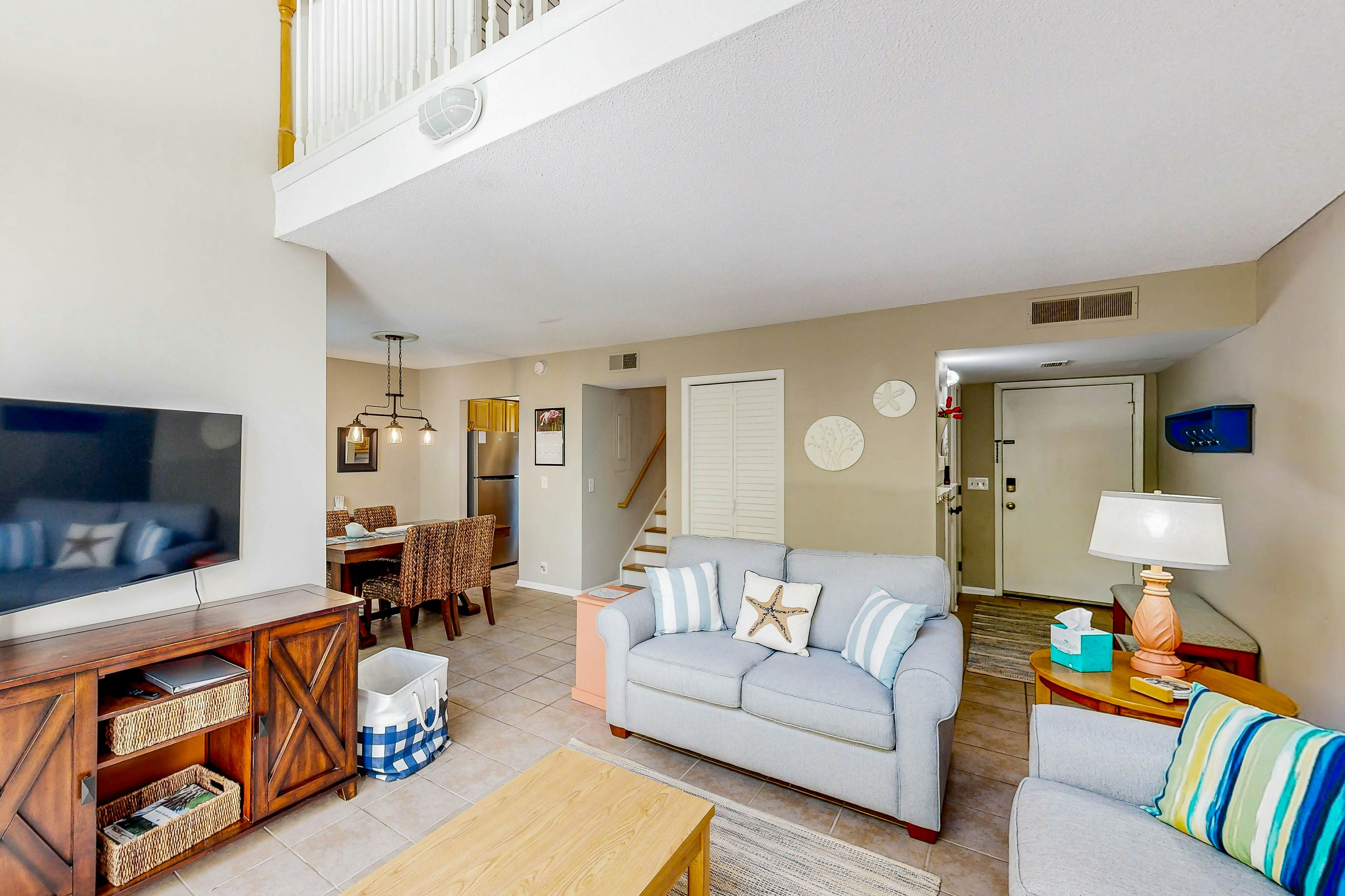 Updated townhome with golf course views, pool, and tennis