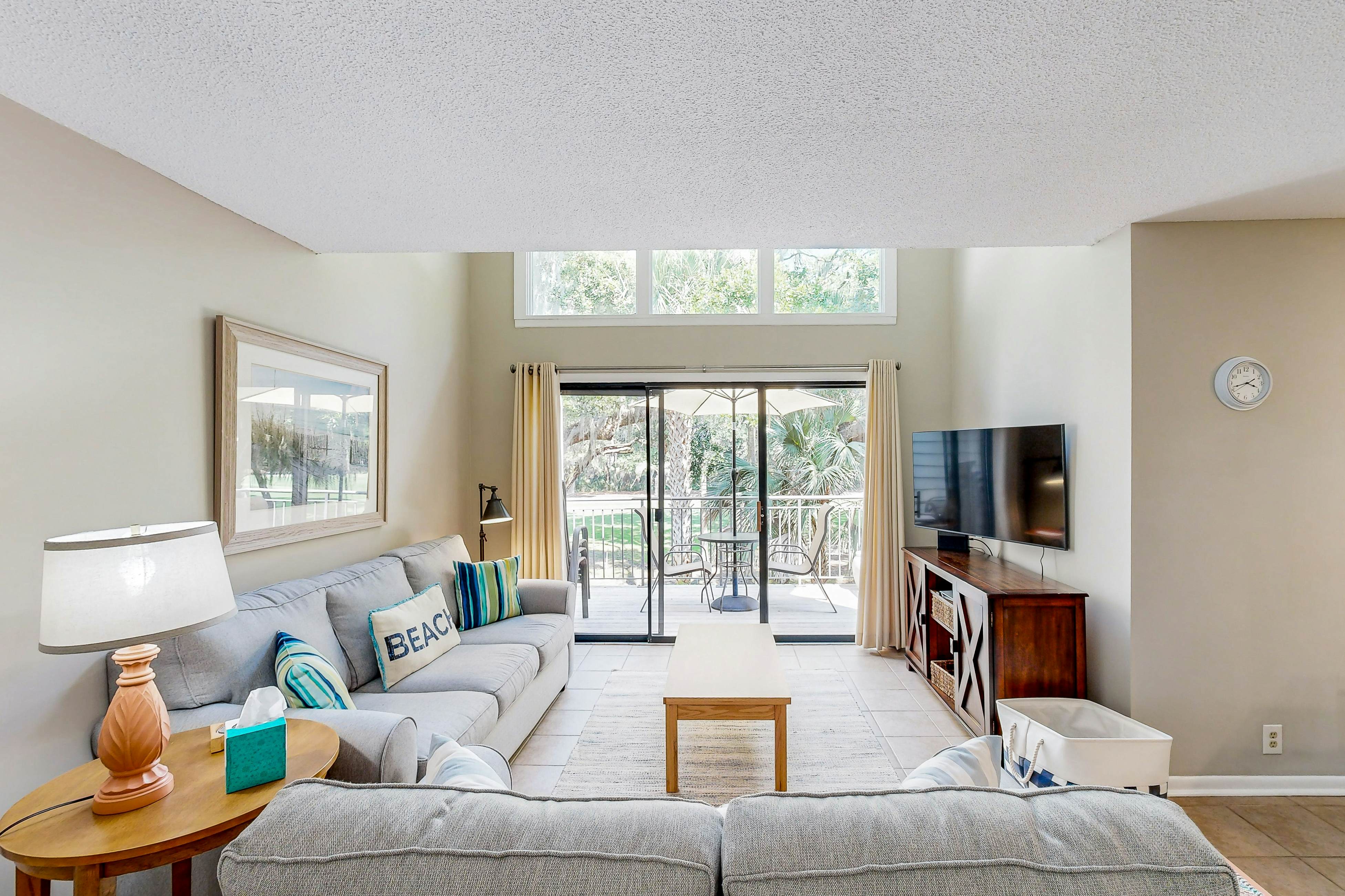 Updated townhome with golf course views, pool, and tennis