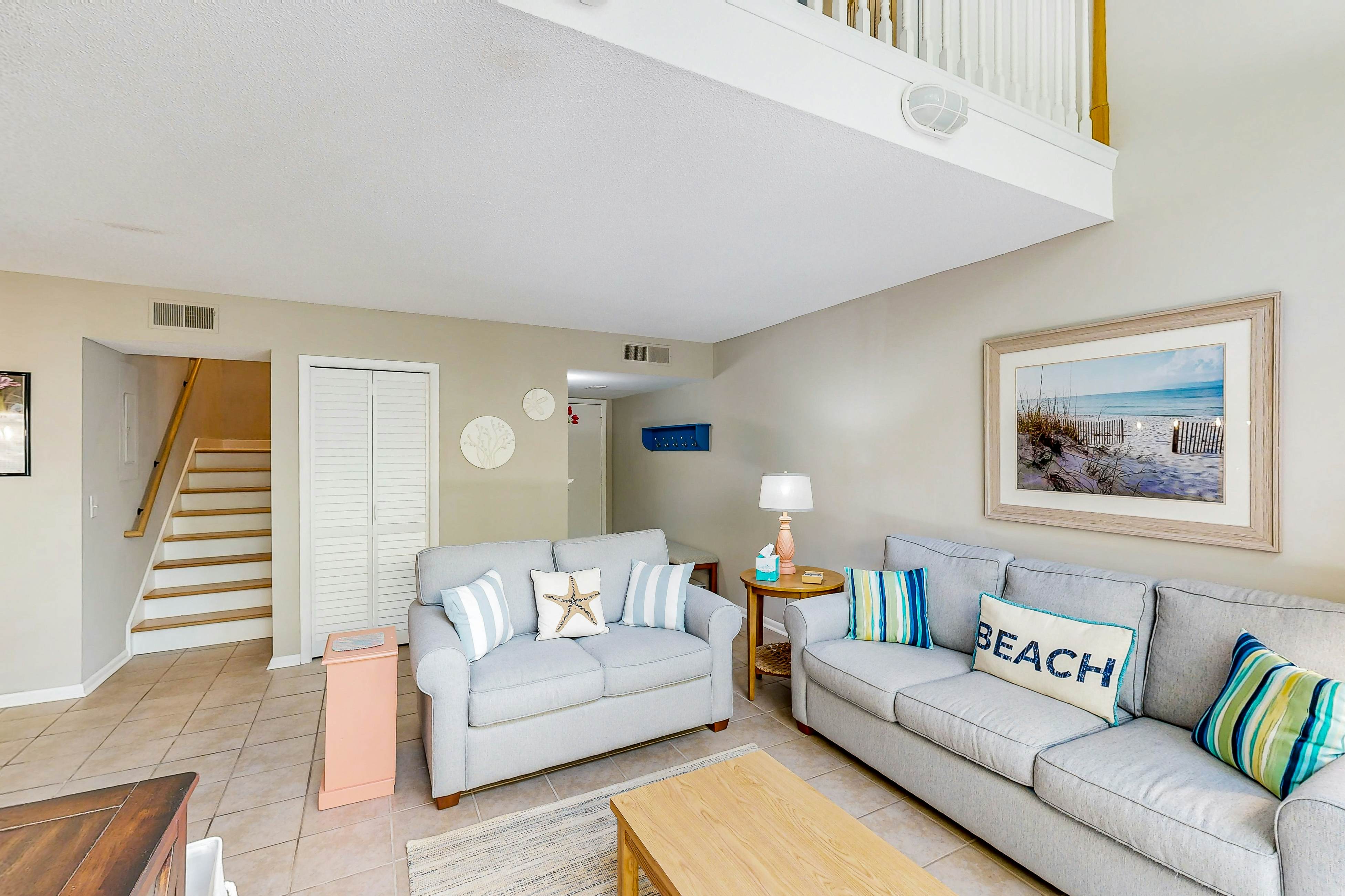 Updated townhome with golf course views, pool, and tennis