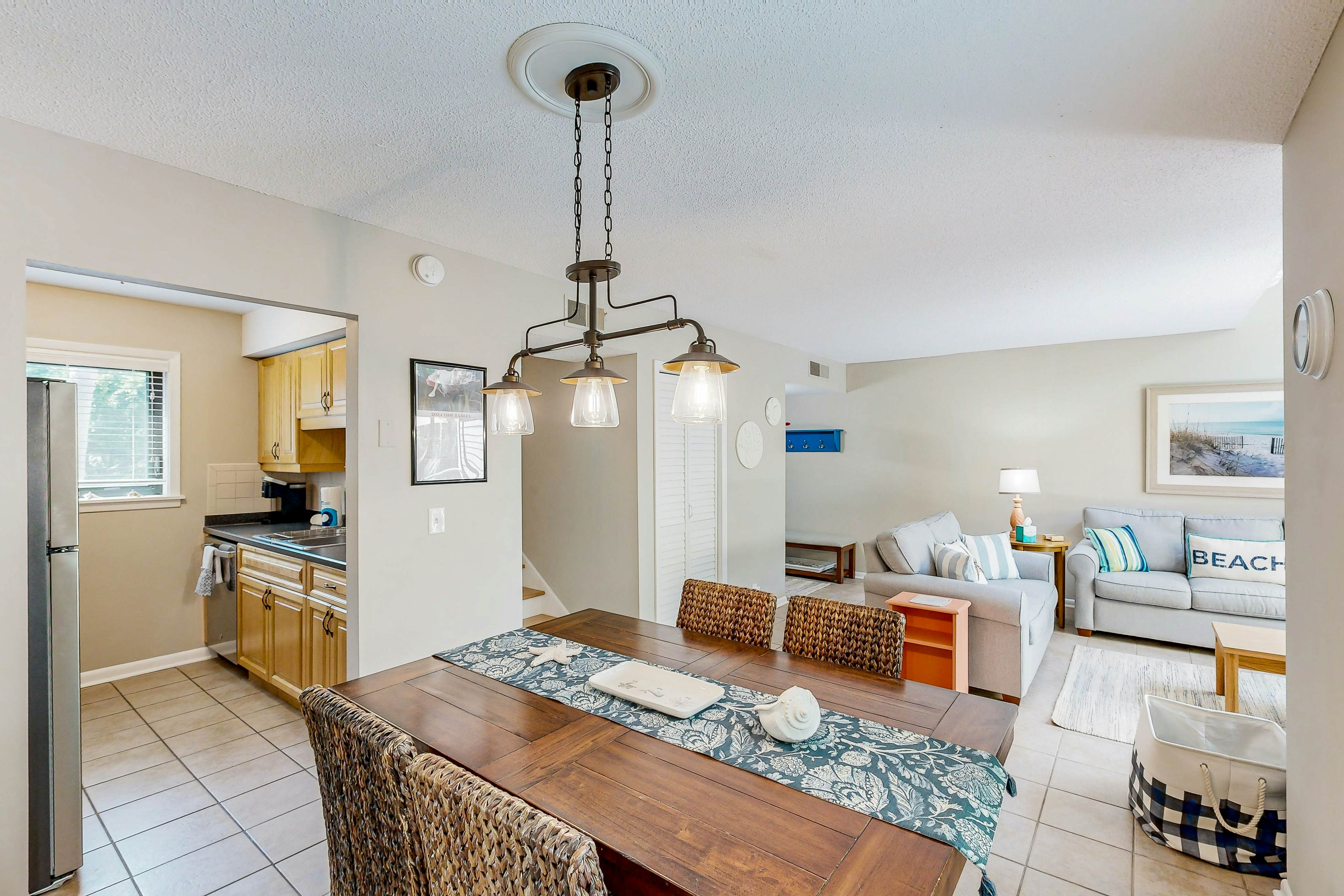 Updated townhome with golf course views, pool, and tennis