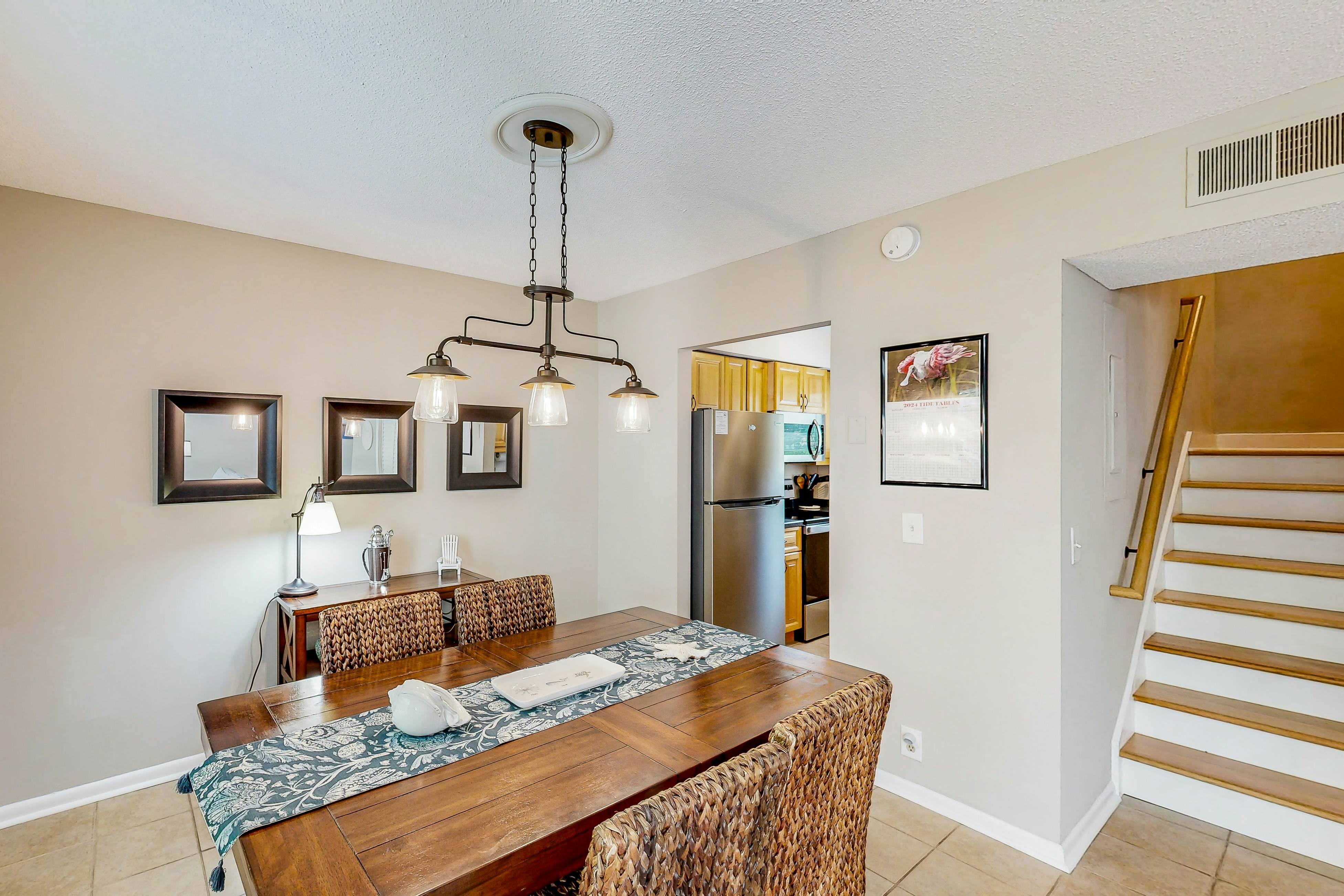 Updated townhome with golf course views, pool, and tennis