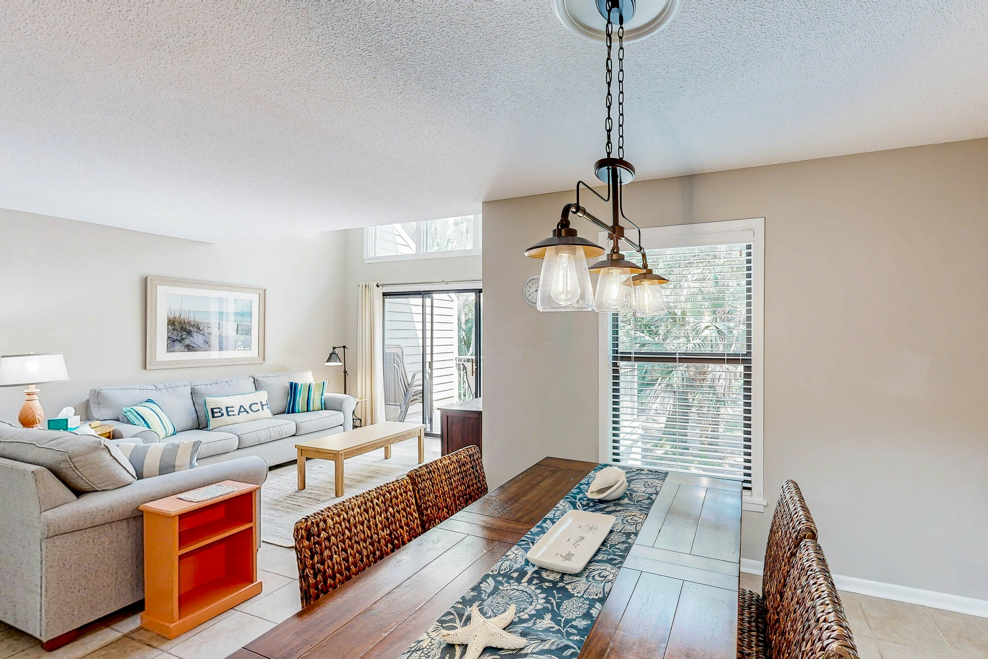 Updated townhome with golf course views, pool, and tennis