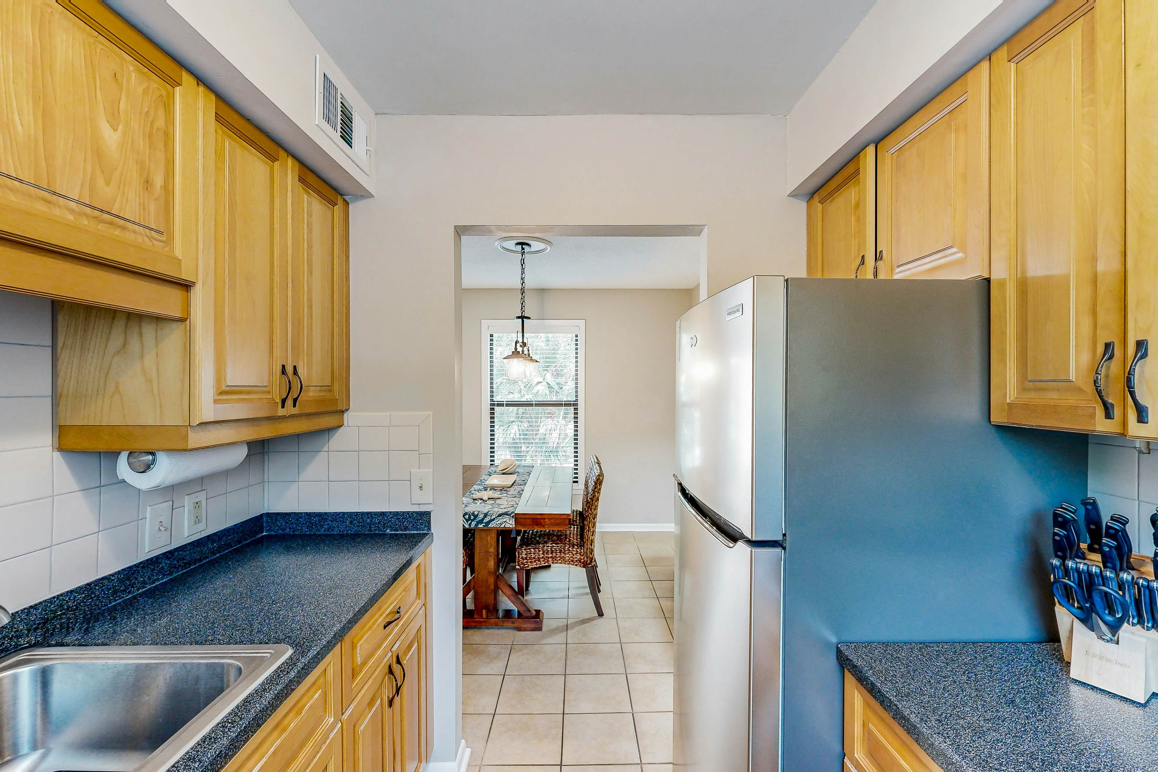 Updated townhome with golf course views, pool, and tennis