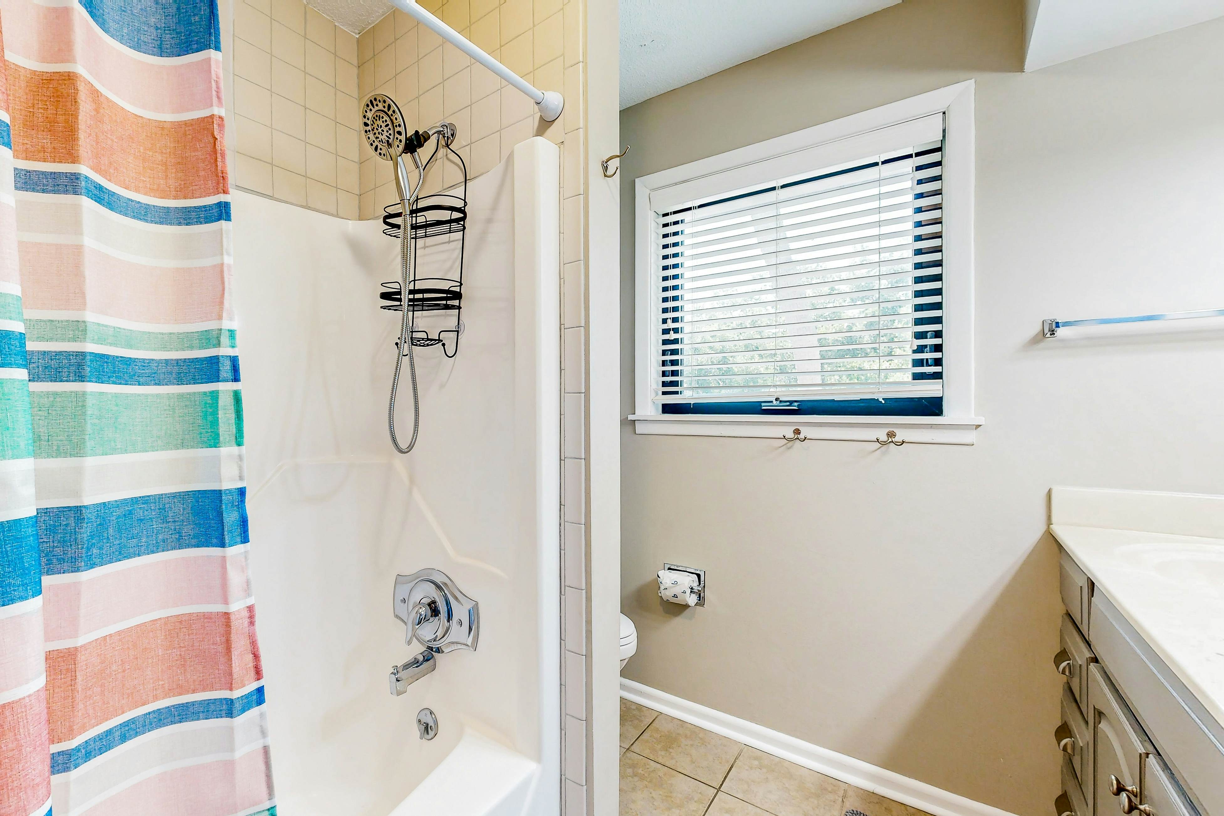 Updated townhome with golf course views, pool, and tennis