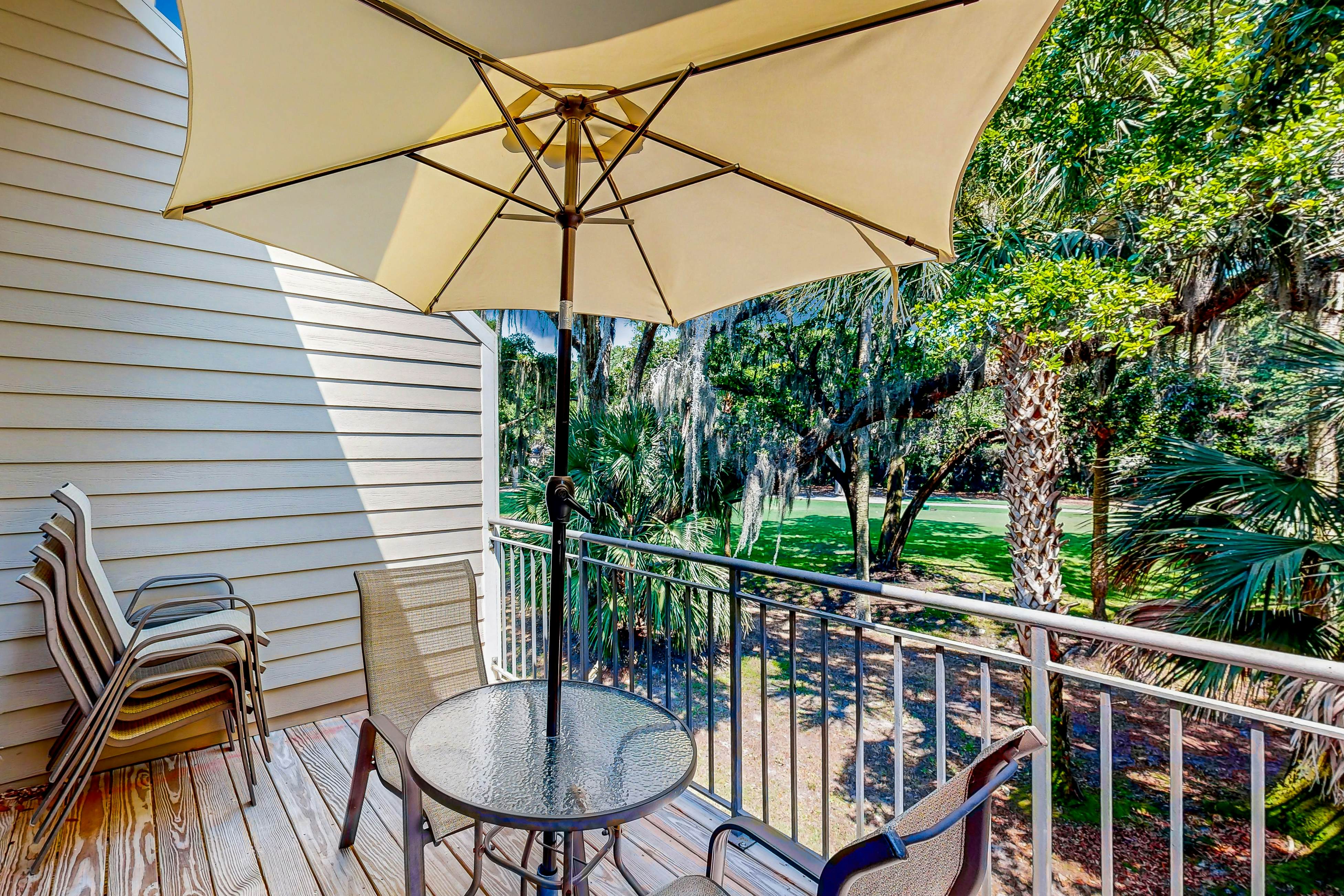 Updated townhome with golf course views, pool, and tennis