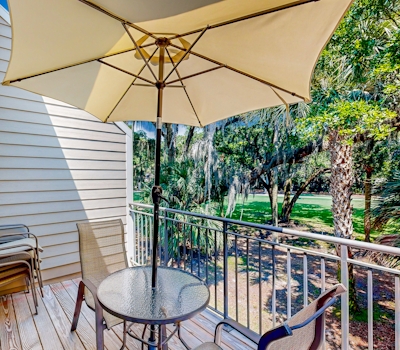 Updated townhome with golf course views, pool, and tennis