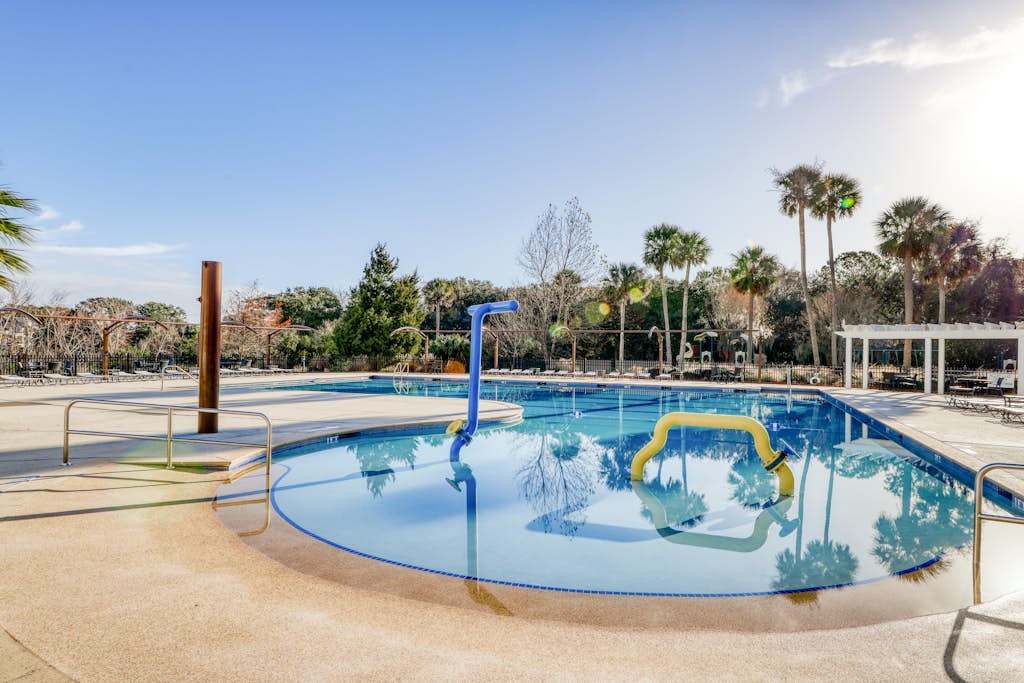 Stylish beach villa with three decks, and golf course views