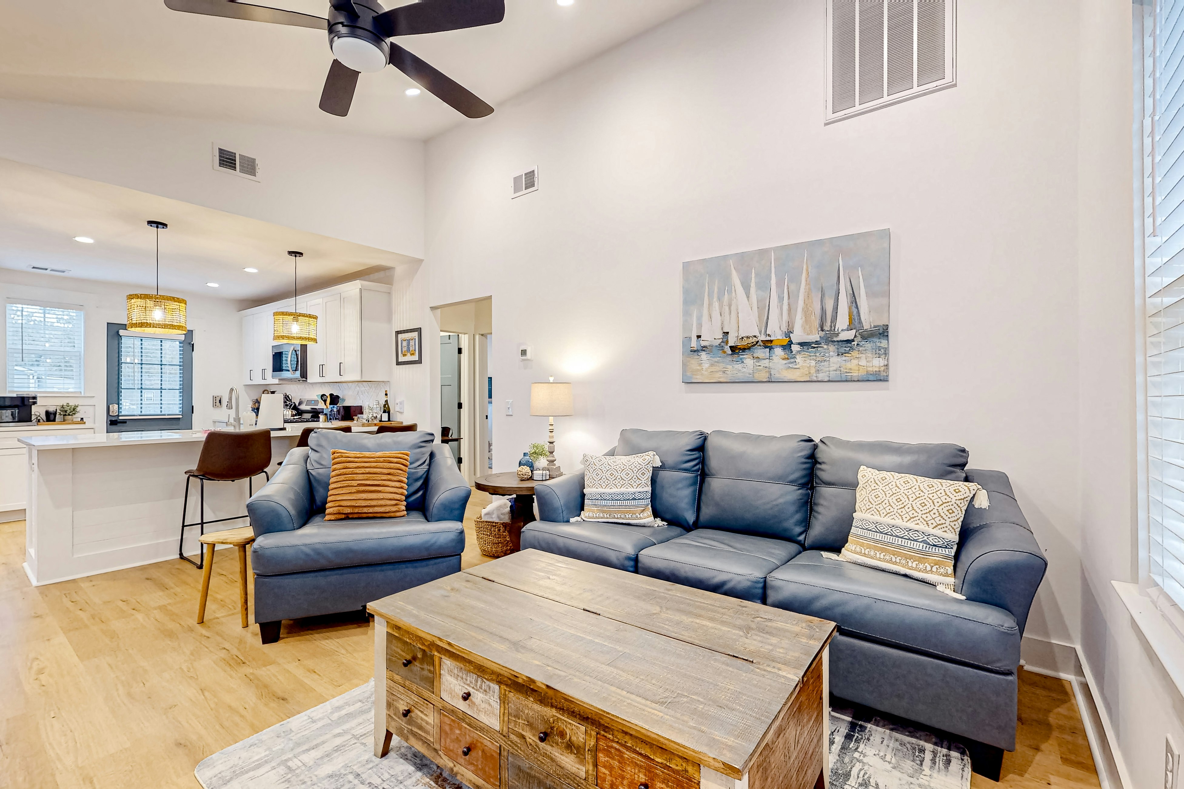 Renovated charmer with chef's kitchen, front porch, work desk, AC, & firepit