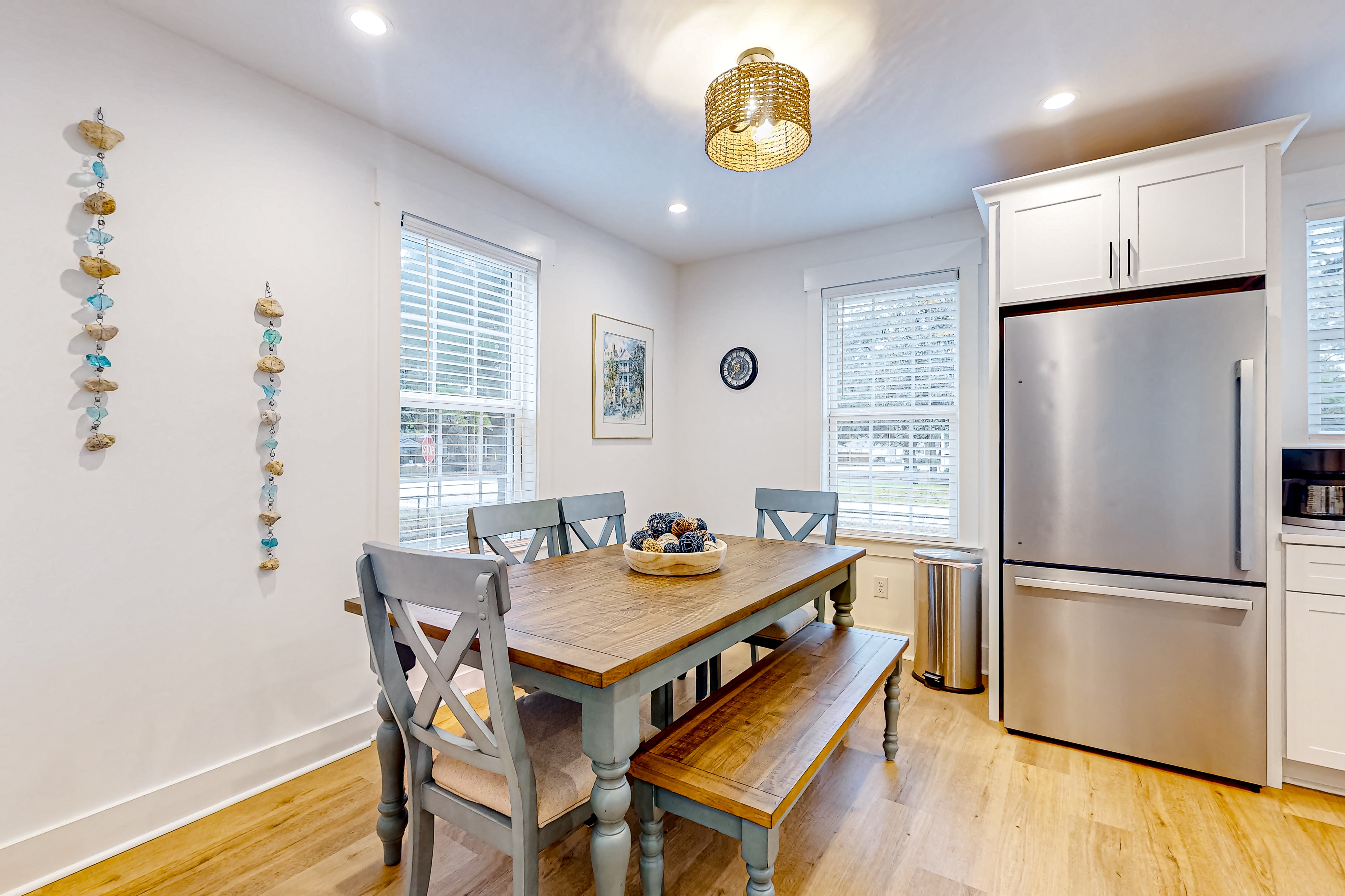 Renovated charmer with chef's kitchen, front porch, work desk, AC, & firepit