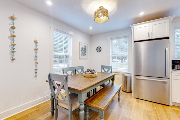 Renovated charmer with chef's kitchen, front porch, work desk, AC, & firepit