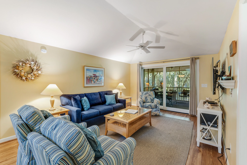 Charming Island Getaway with a Furnished Deck Offering Forest & Fairway Views