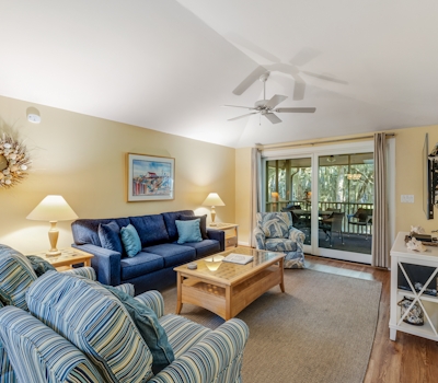 Charming Island Getaway with a Furnished Deck Offering Forest & Fairway Views