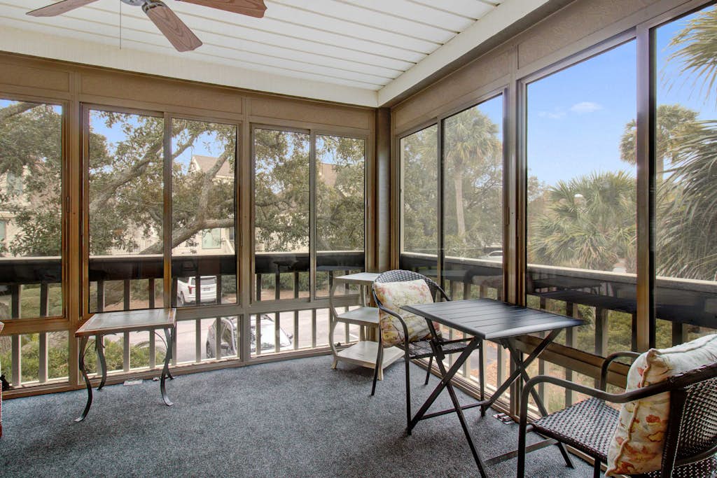 Villa with screened porch & fabulous views - just across the street from the beach