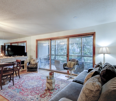 Comfortable ground-floor condo with enclosed patio, washer/dryer, & AC