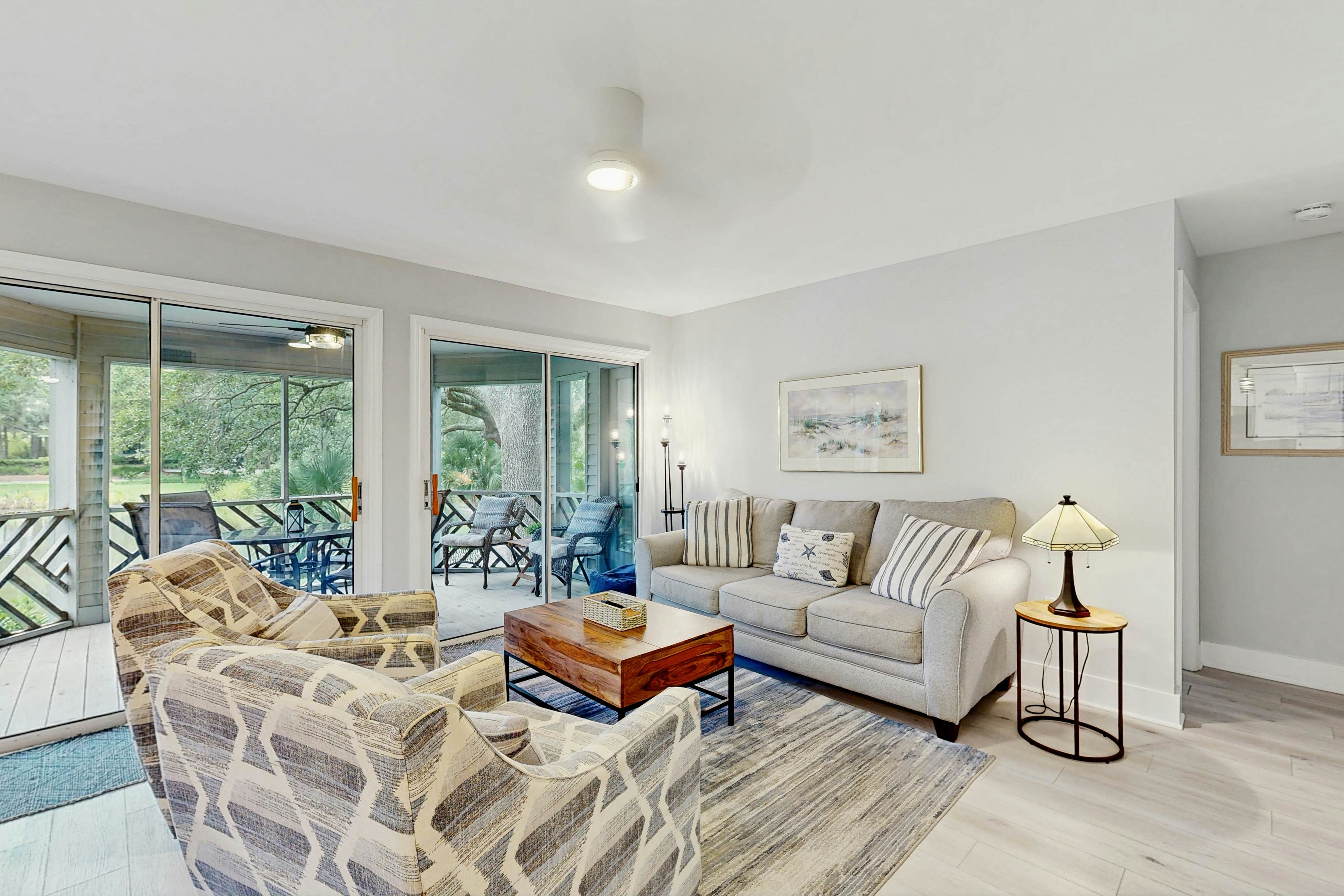 Enchanting lagoon-view villa - quick beach access, tennis court, & screened deck