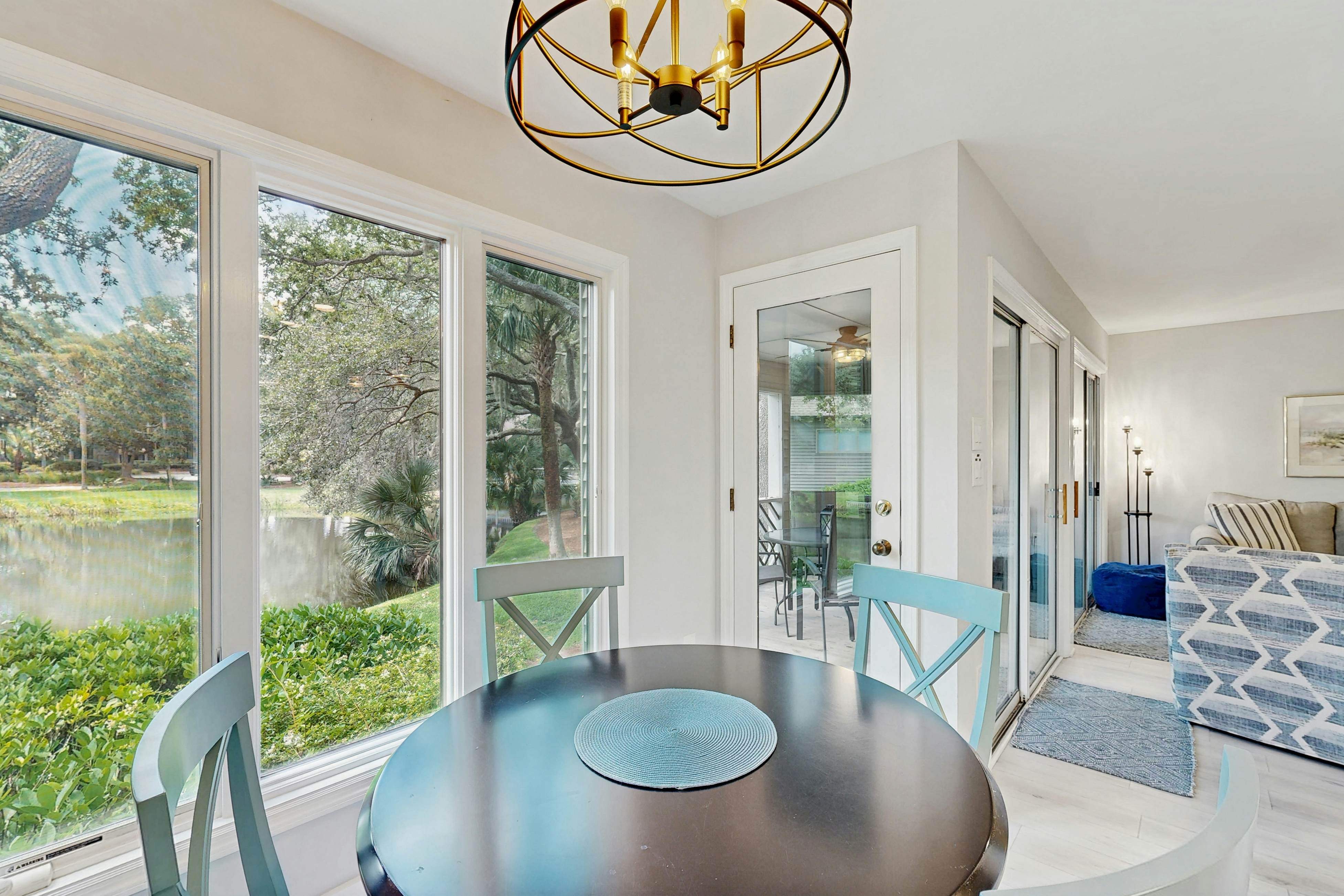 Enchanting lagoon-view villa - quick beach access, tennis court, & screened deck