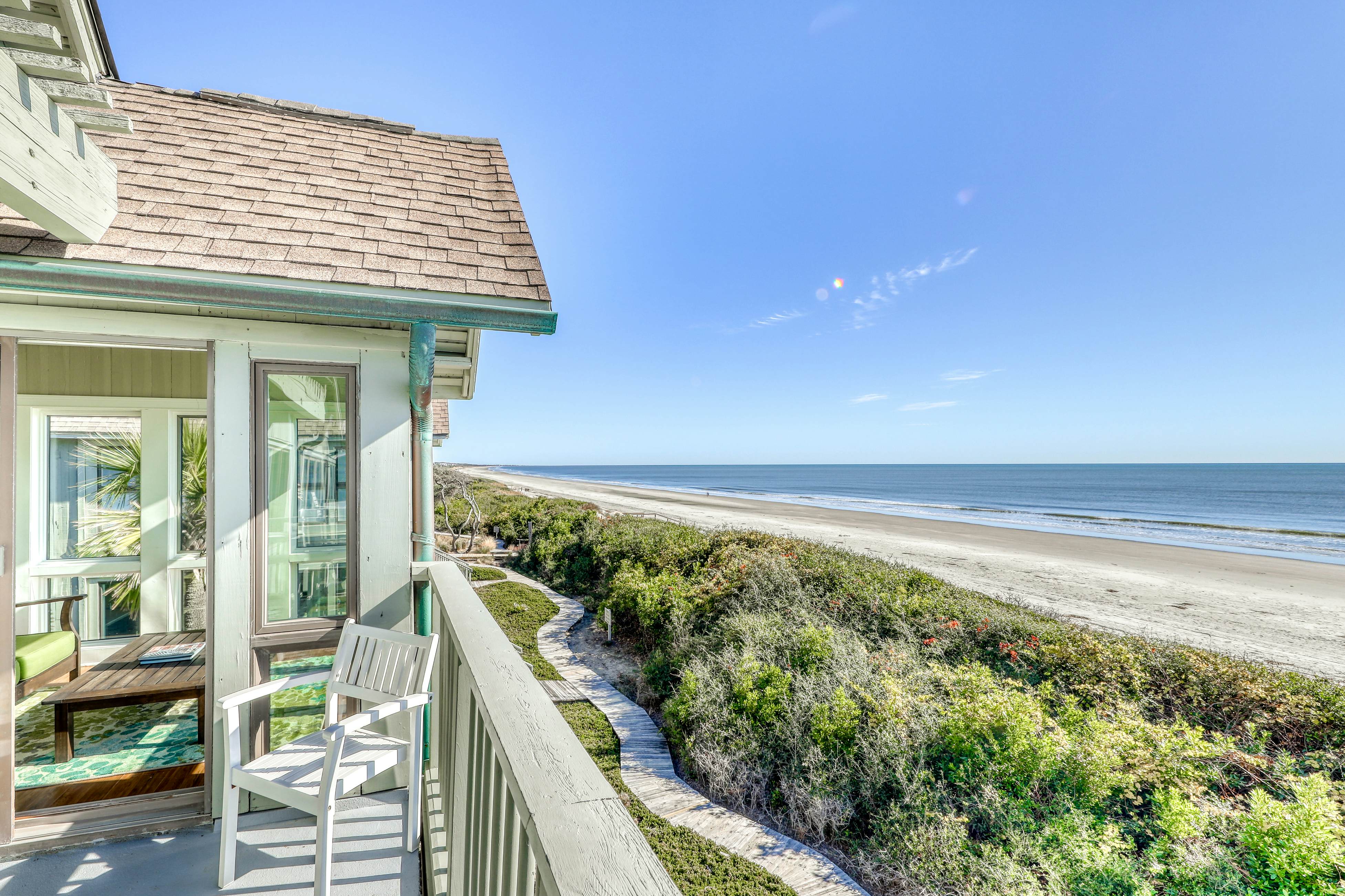 Dog-Friendly Waterfront Condo with Furnished Deck & Beach Views