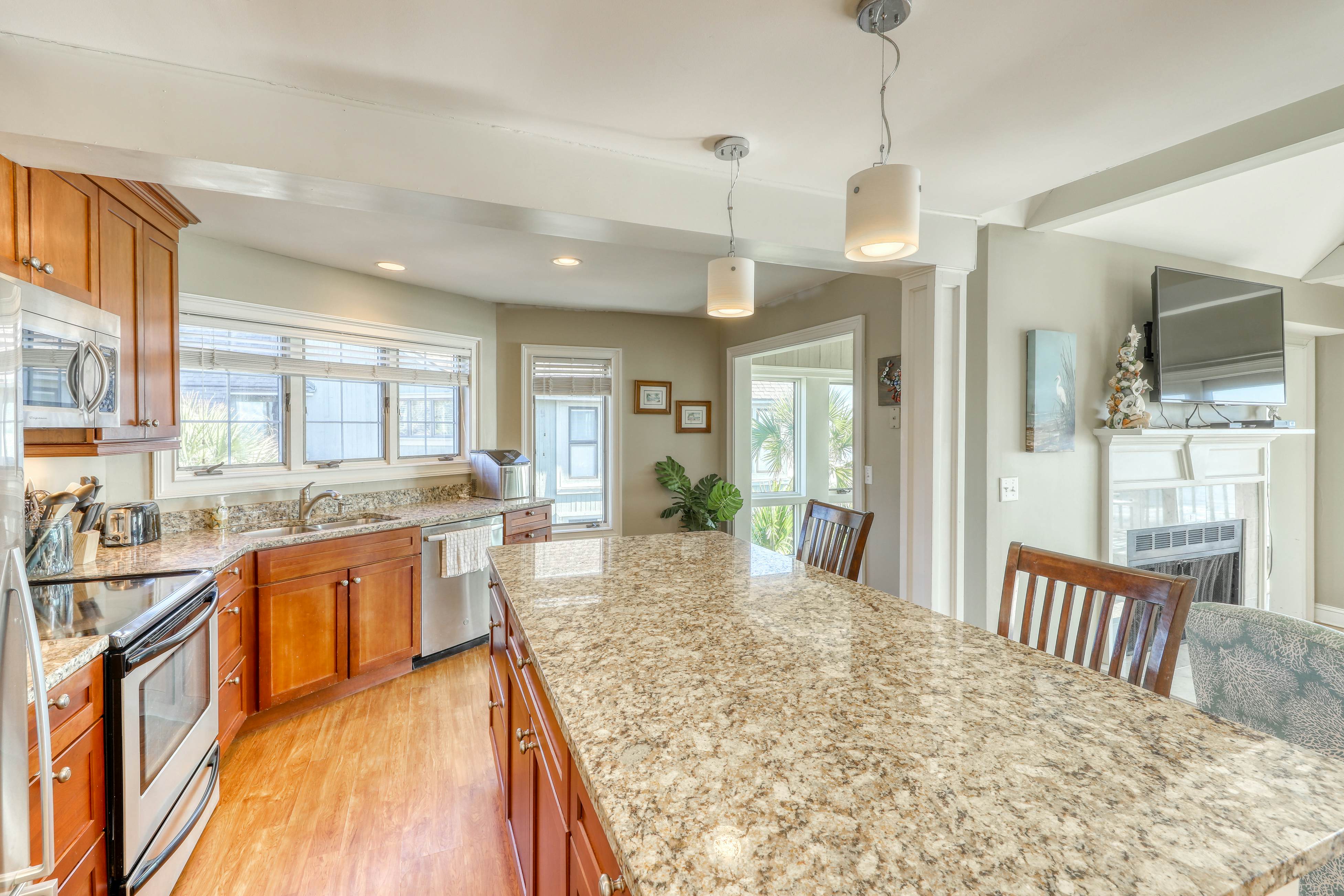 Dog-Friendly Waterfront Condo with Furnished Deck & Beach Views